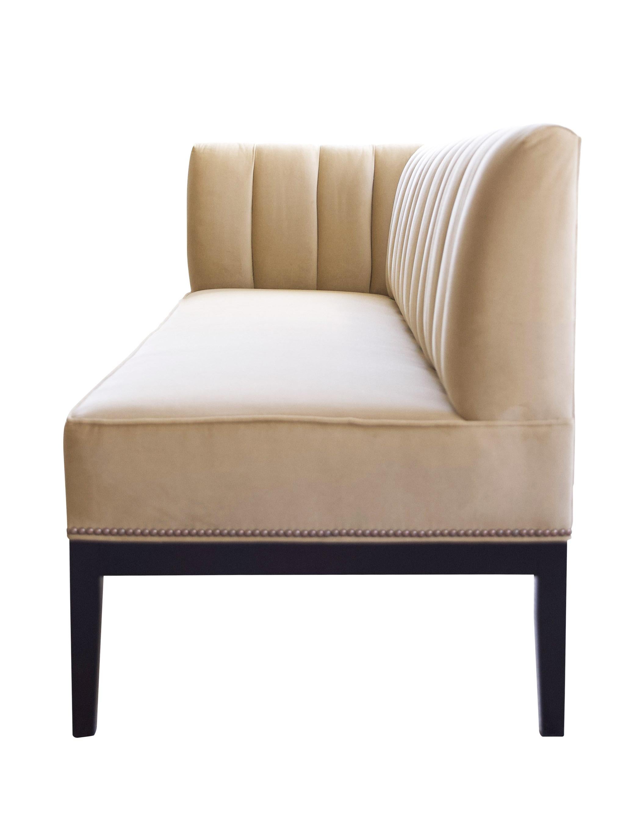 Lisa Tharp Collection  Channel Banquette 

Bring the glamour of an elegant restaurant booth home. Soft padded channels lend comfortable back support for lingering long after the meal. Left or right arm design cozies up to a corner, while the armless