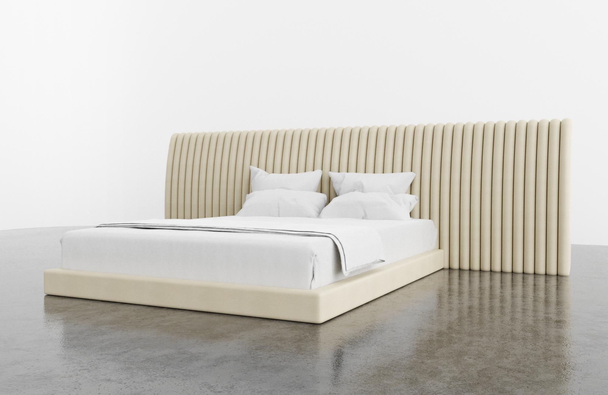 The Channel bed features a modern channeled upholstered headboard and matching upholstered frame. Available in King, Cali King, Queen or Twin sizes. Fully custom and made to order in California. As shown in Queen Size in Kimodo faux leather/cream