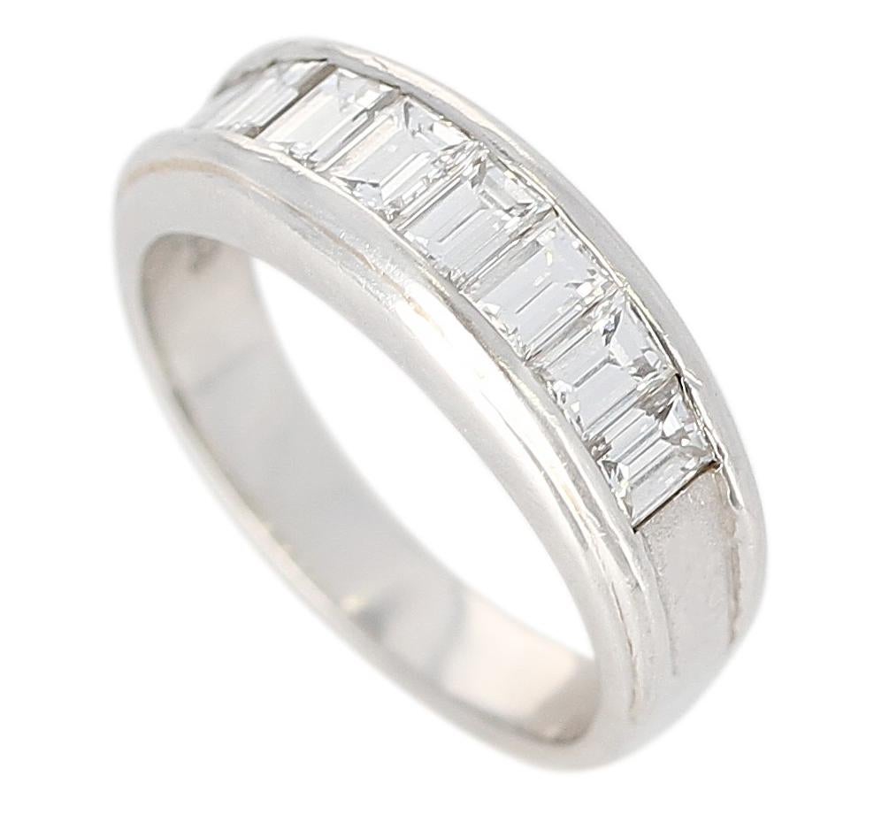 A Channel Invisible Set Diamond Wedding Band in 18K White Gold and Platinum. Diamond Weight: 1.08 carats, Total Weight: 6.73 grams, Ring Size US 5.50.