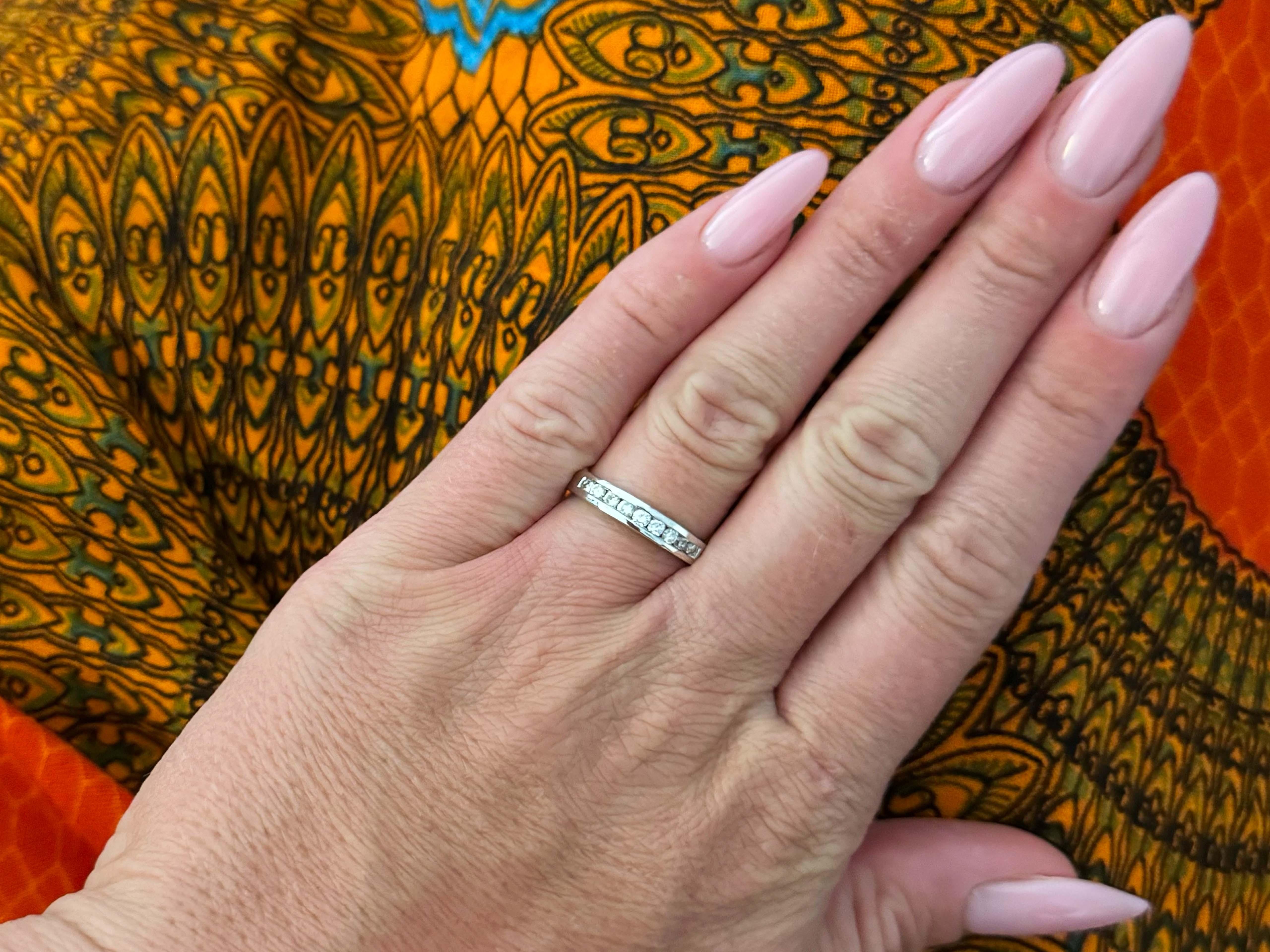 Item Specifications:

Metal: Platinum

Diamond Count: 9 brilliant cut

Total Diamond Carat Weight: ~0.35 carats 

Diamond Color: G-I

Diamond Clarity: VS2-SI2

Ring Size: 6.5

Total Weight: 4.8Grams

Stamped: 