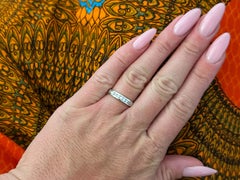 Channel Set 9 Brilliant Cut Diamond Band Ring Platinum