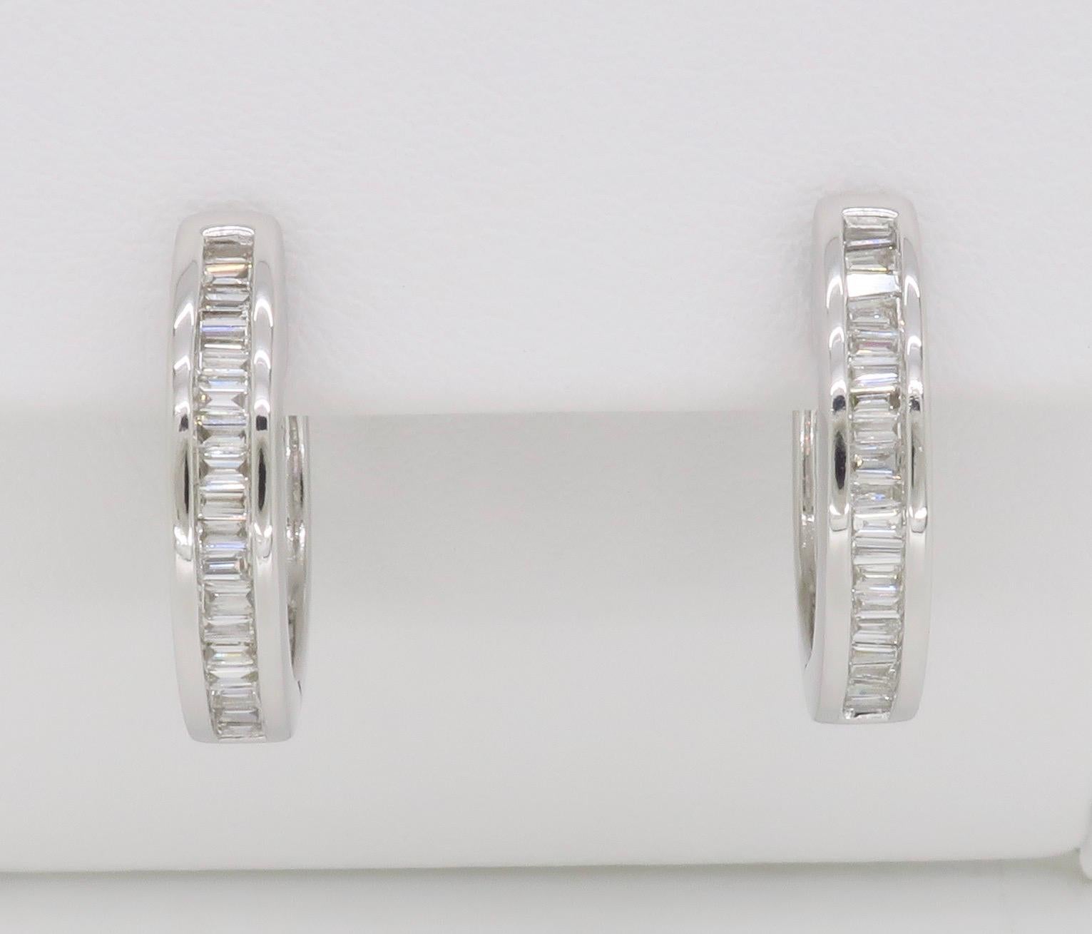 Channel set baguette cut diamond hoop earrings made in 18k white gold. 

Diamond Carat Weight: .75CTW
Diamond Cut: Baguette Cut Diamonds
Color: Average G-H
Clarity: Average VS
Metal: 18K White Gold
Marked/Tested: Stamped “18k 750