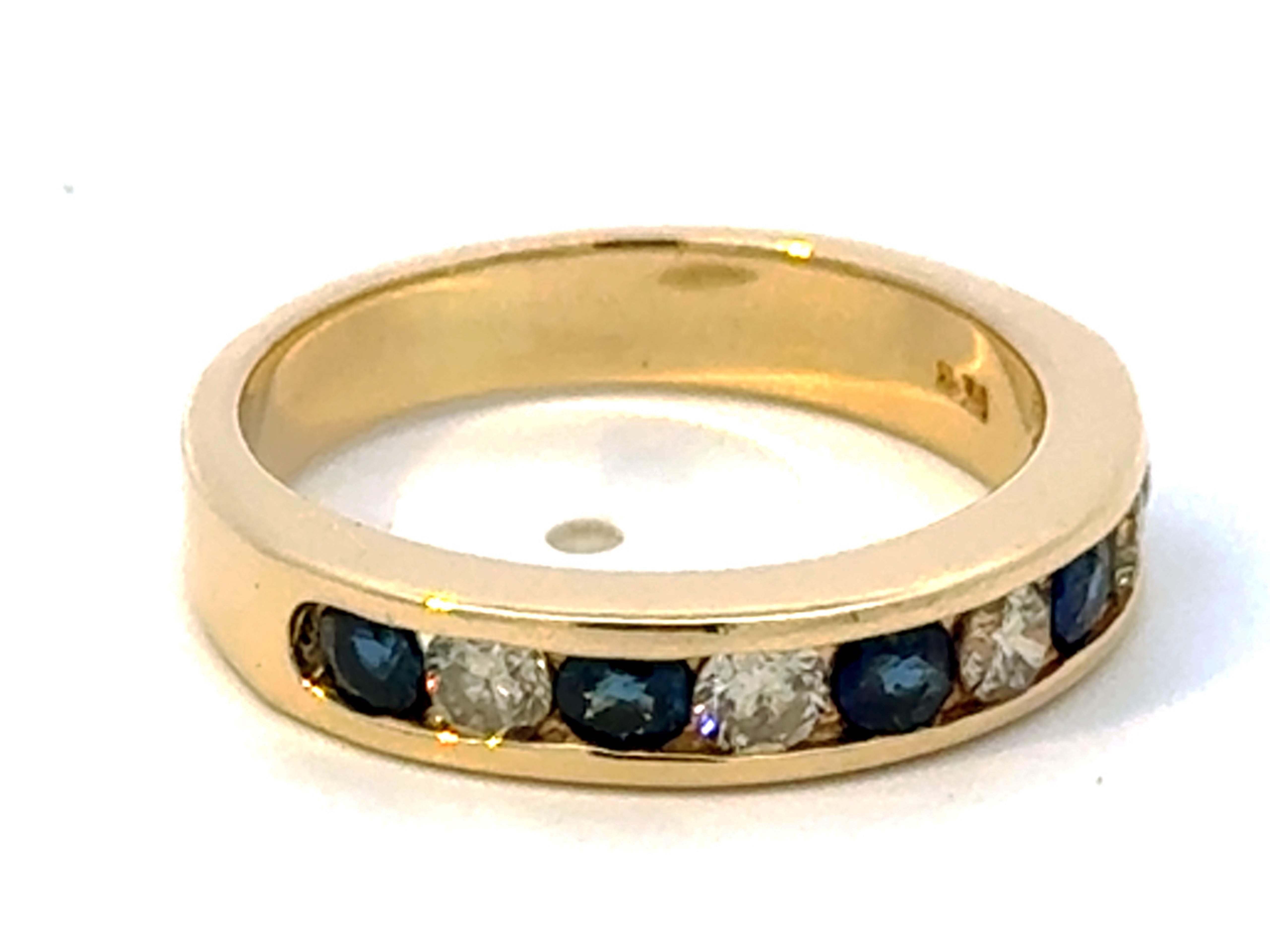 Oval Cut Channel Set Blue Sapphire and Diamond Band Ring 14K Yellow Gold For Sale