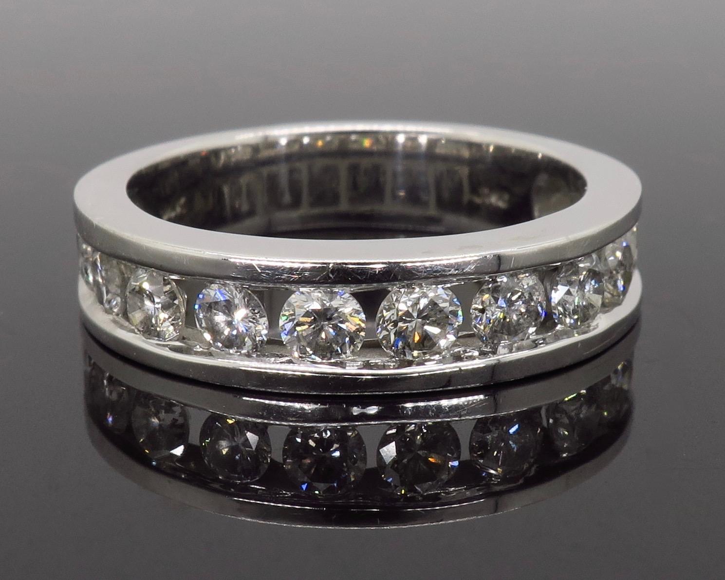 One carat Round Brilliant Diamond band crafted in 14K white gold.

Gemstone: Diamond
Diamond Carat Weight: Approximately 1.00ctw
Diamond Cut: Round Brilliant Cut
Color: Average G-I
Clarity: Average I
Metal: 14K White Gold
Marked/Tested: Stamped “14K