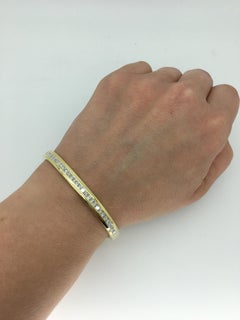 Channel Set Diamond Bangle Bracelet in 18 Karat Yellow Gold