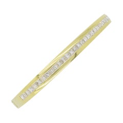 Channel Set Diamond Bangle Bracelet in 18 Karat Yellow Gold