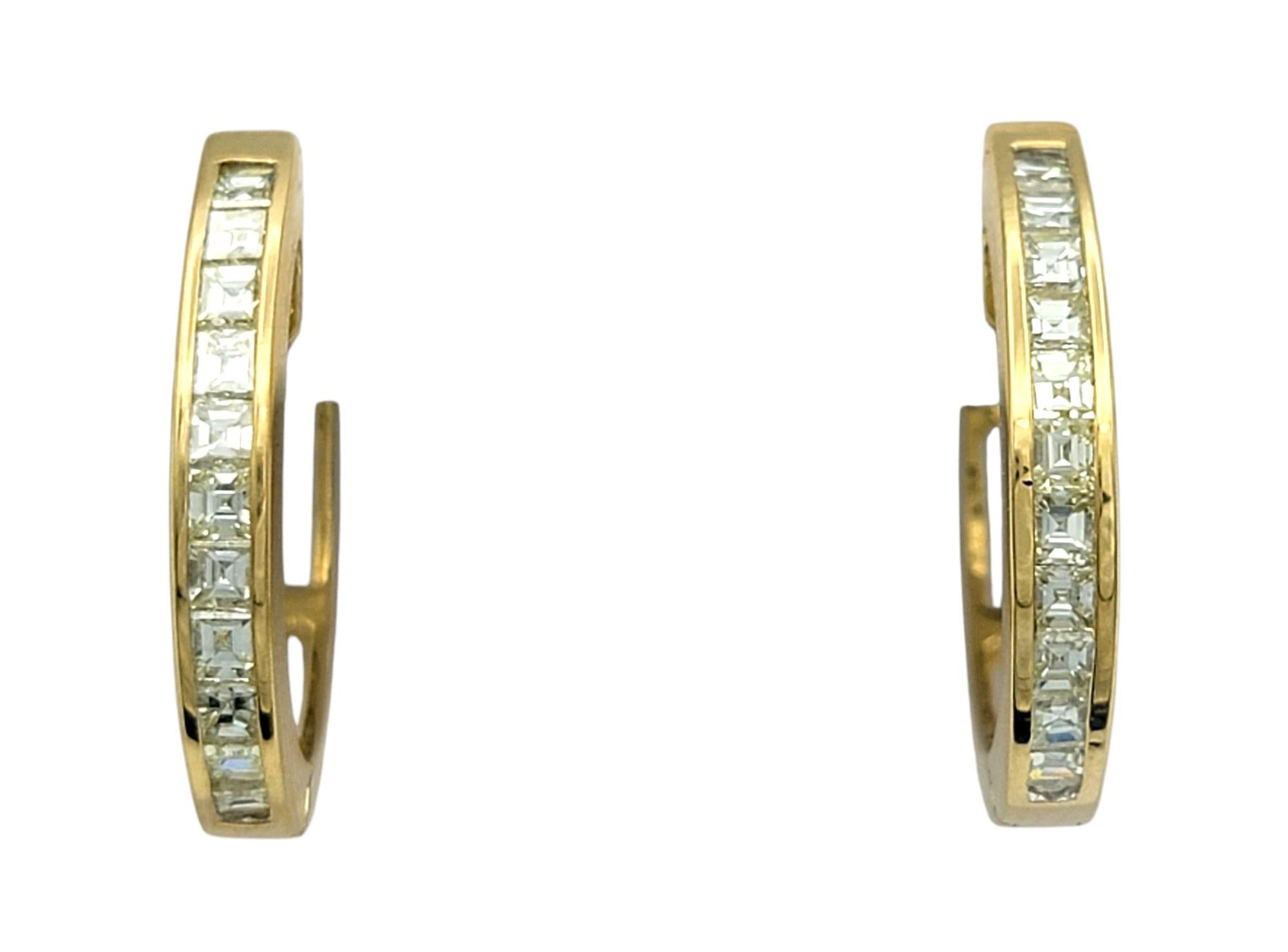 Contemporary Channel Set Emerald Cut Diamond Huggie Hoop Earrings in 18 Karat Yellow Gold For Sale