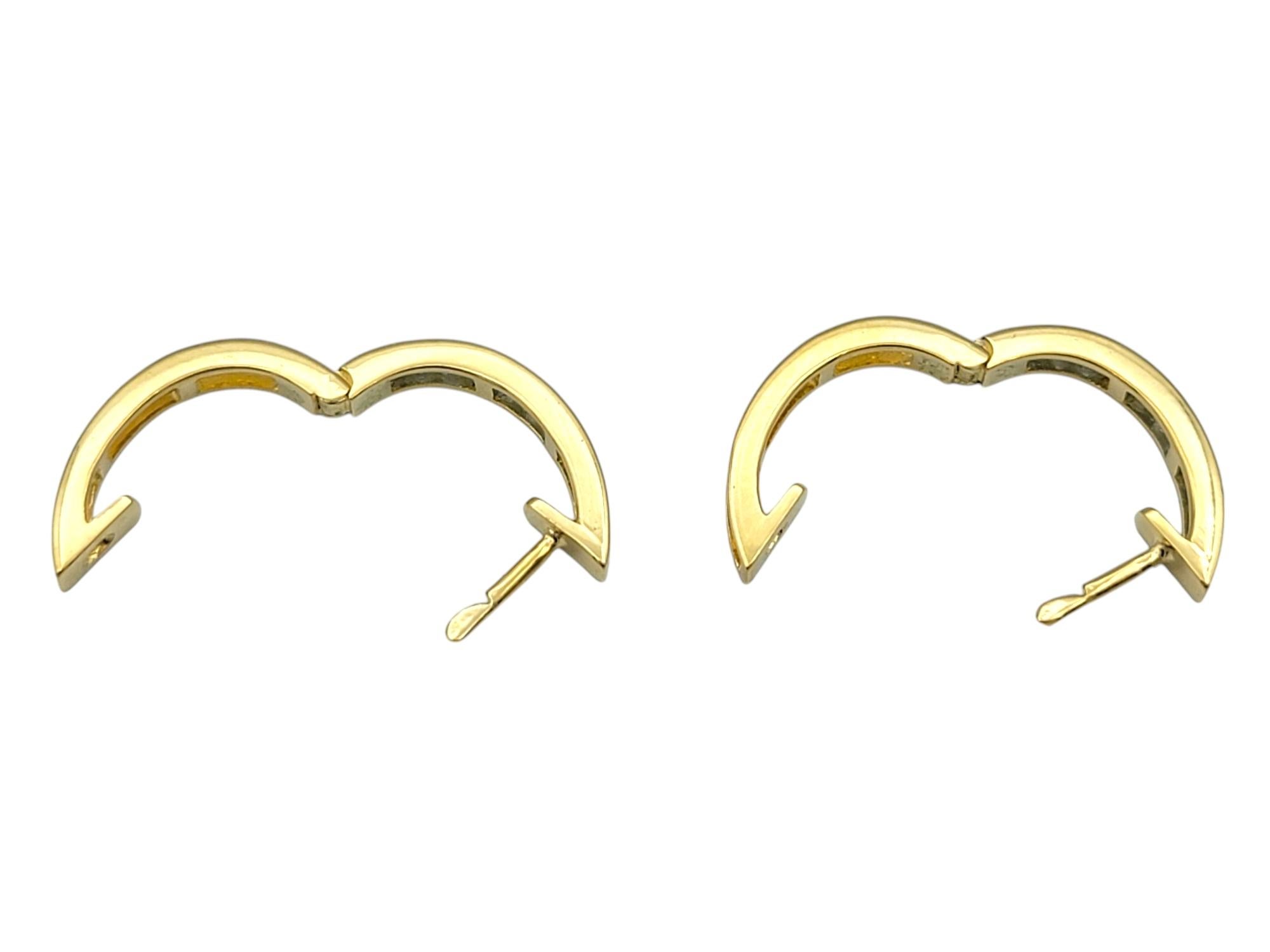 Women's Channel Set Emerald Cut Diamond Huggie Hoop Earrings in 18 Karat Yellow Gold For Sale