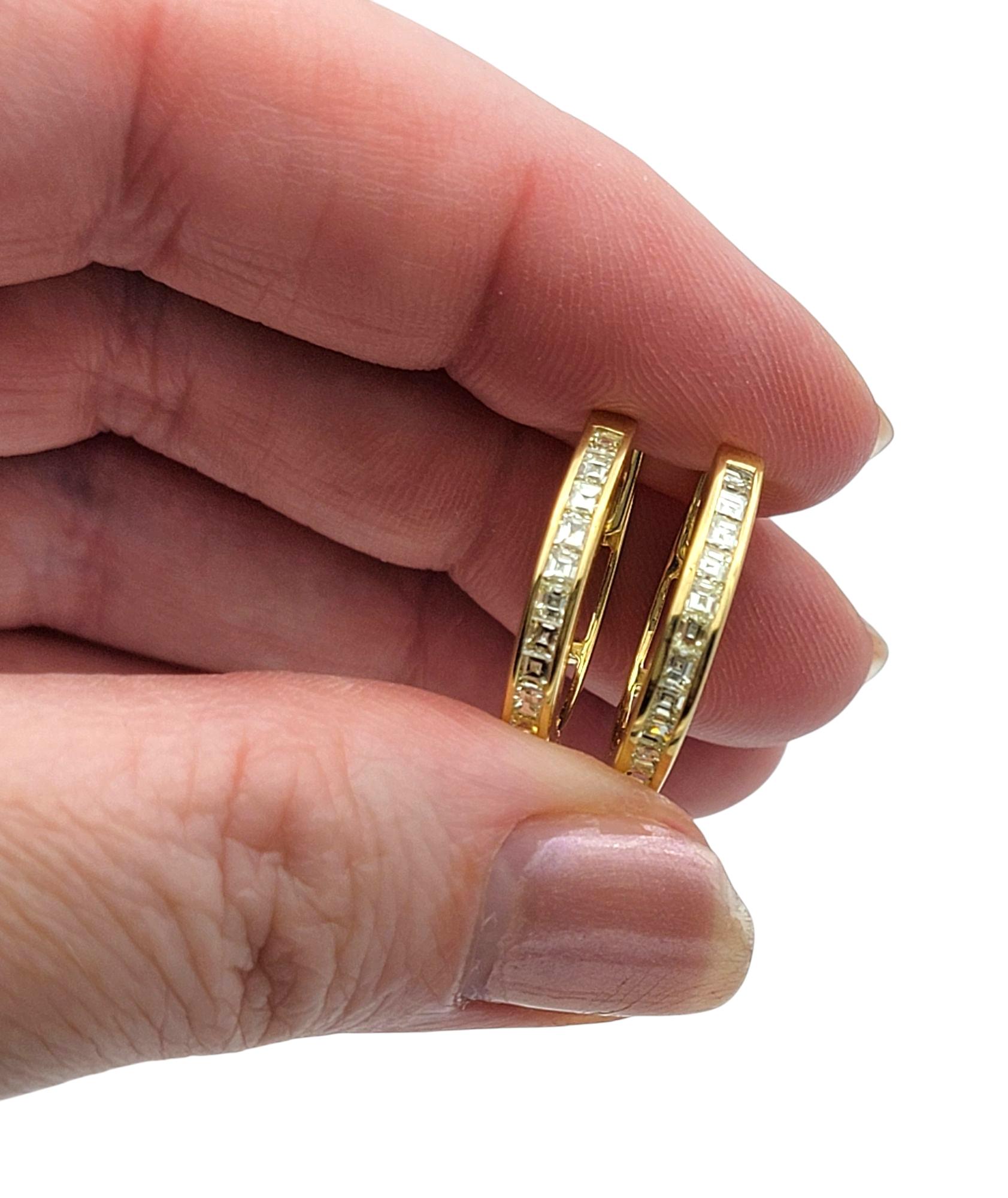Channel Set Emerald Cut Diamond Huggie Hoop Earrings in 18 Karat Yellow Gold For Sale 2
