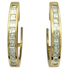 Channel Set Emerald Cut Diamond Huggie Hoop Earrings in 18 Karat Yellow Gold