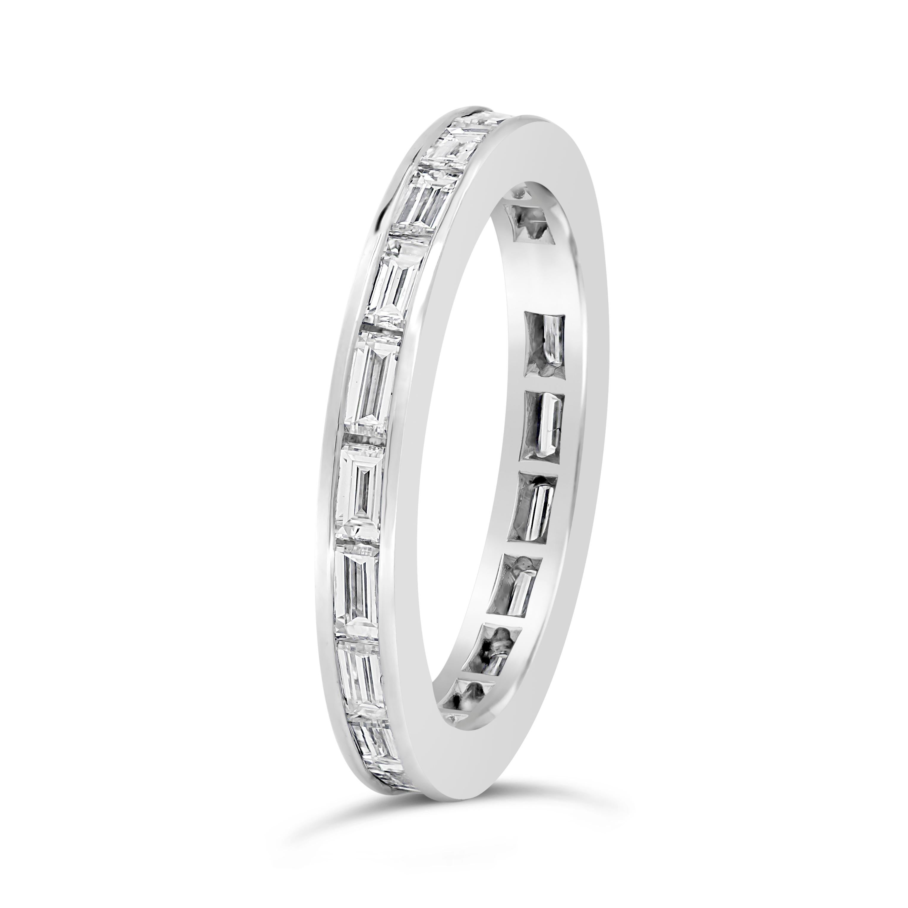 A unique and chic wedding band design showcasing baguette diamonds weighing 0.90 carats total. Elegantly set in platinum. Size 5 US.

