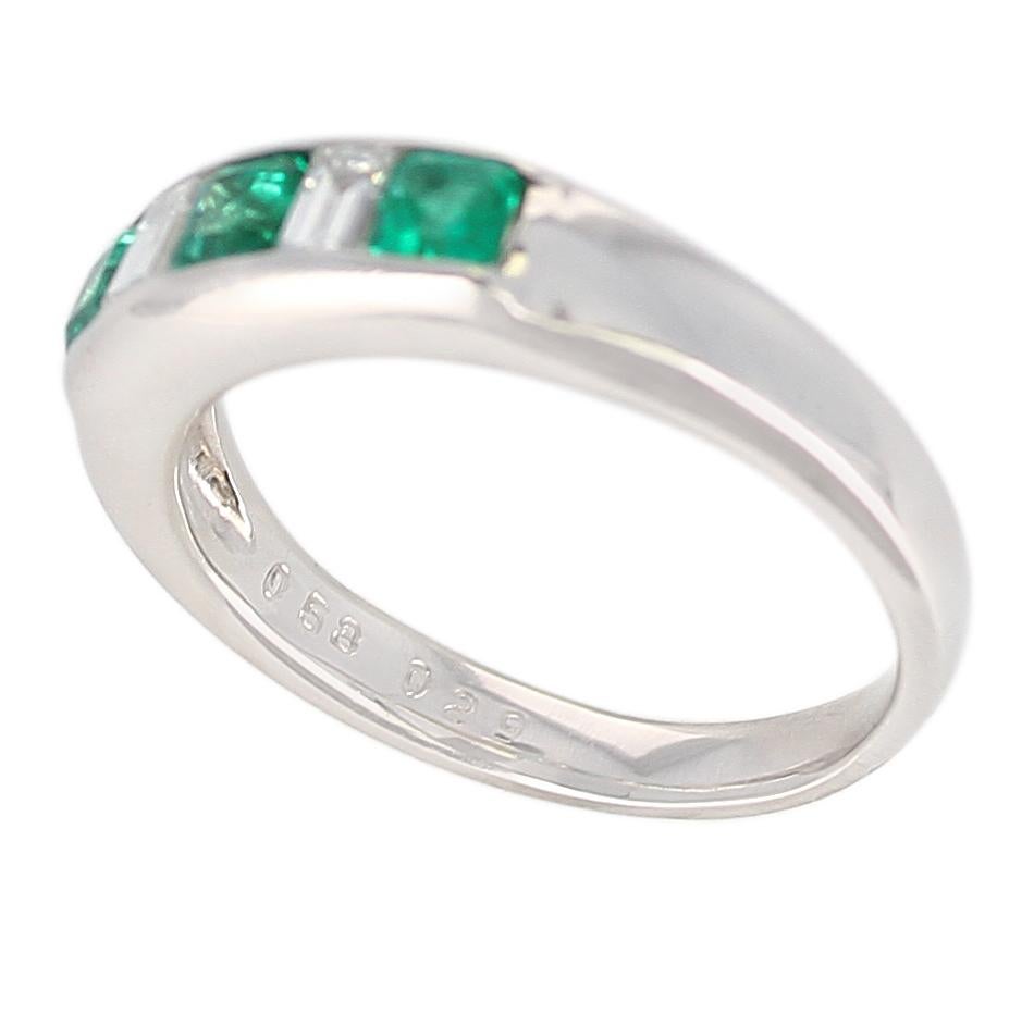 Channel-Set Invisible Emerald and Diamond Platinum Bridal Ring In Excellent Condition In New York, NY