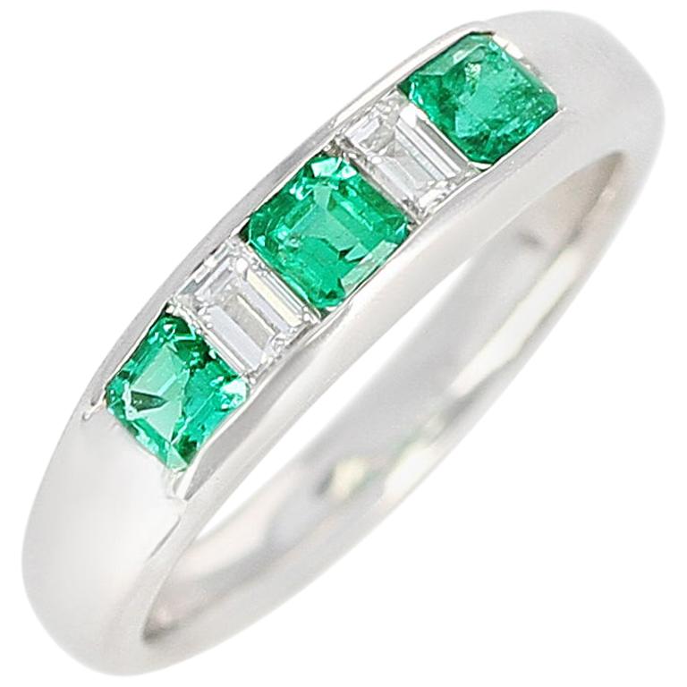 Channel-Set Invisible Emerald and Diamond Platinum Bridal Ring