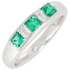 Vintage Channel-Set Invisible Emerald and Diamond Platinum Bridal Ring