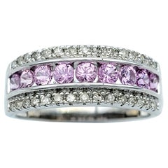 Anillo de zafiro rosa y diamante redondo engastados en oro blanco de 14 quilates