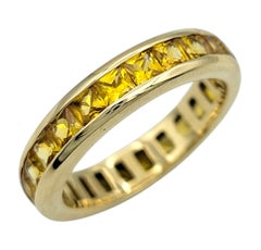 Channel Set Princess Cut Yellow Sapphire Eternity Band Ring 14 Karat Yellow Gold
