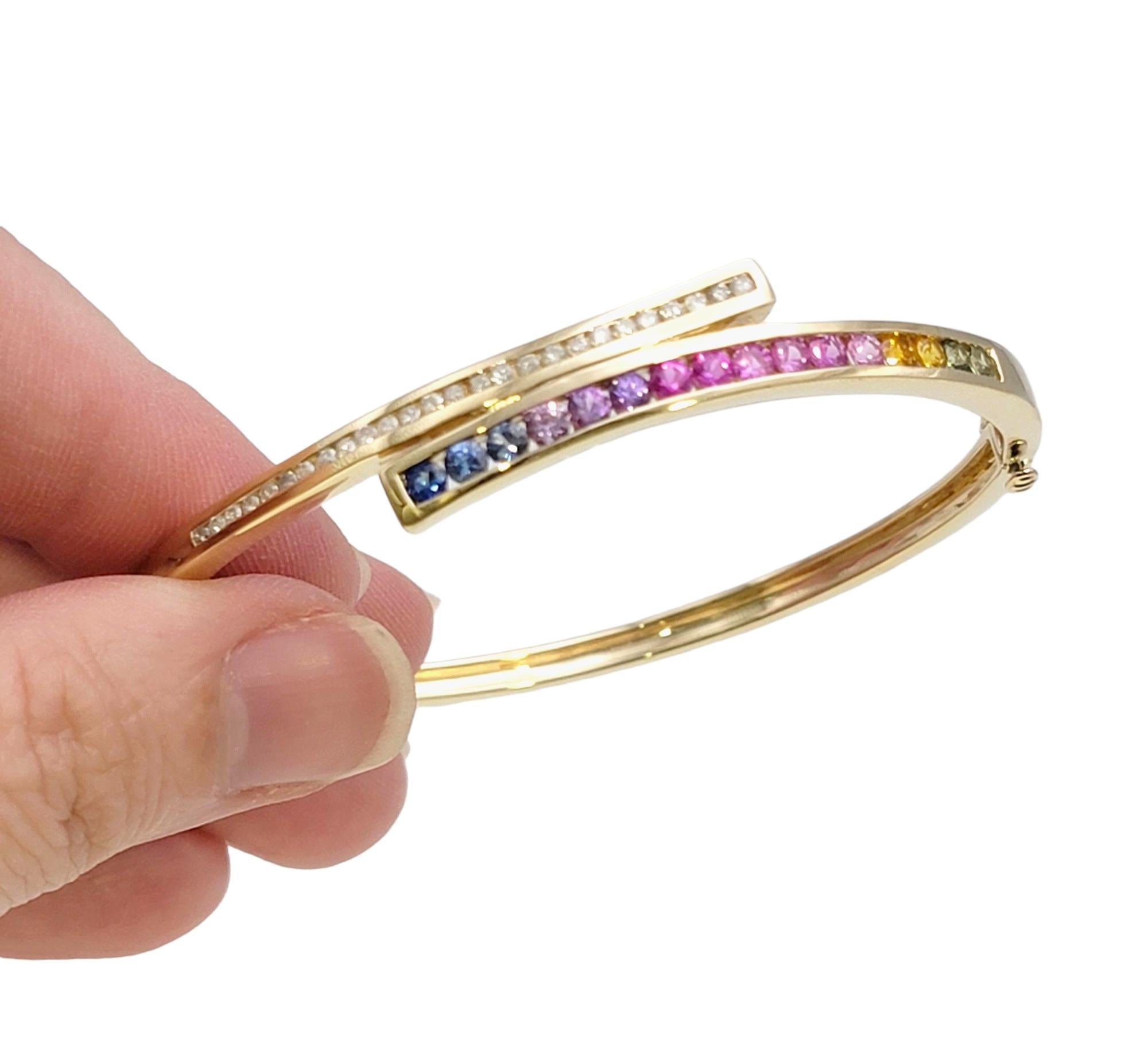  Channel Set Rainbow Sapphire and Diamond Bypass Bangle Bracelet in Yellow Gold For Sale 6