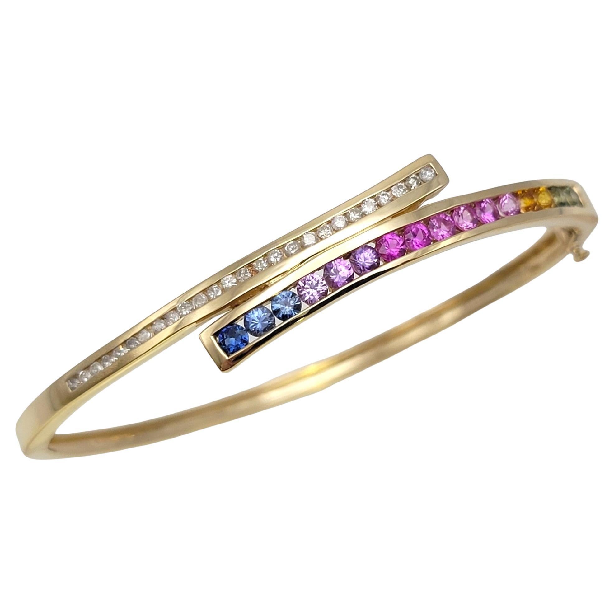  Channel Set Rainbow Sapphire and Diamond Bypass Bangle Bracelet in Yellow Gold For Sale