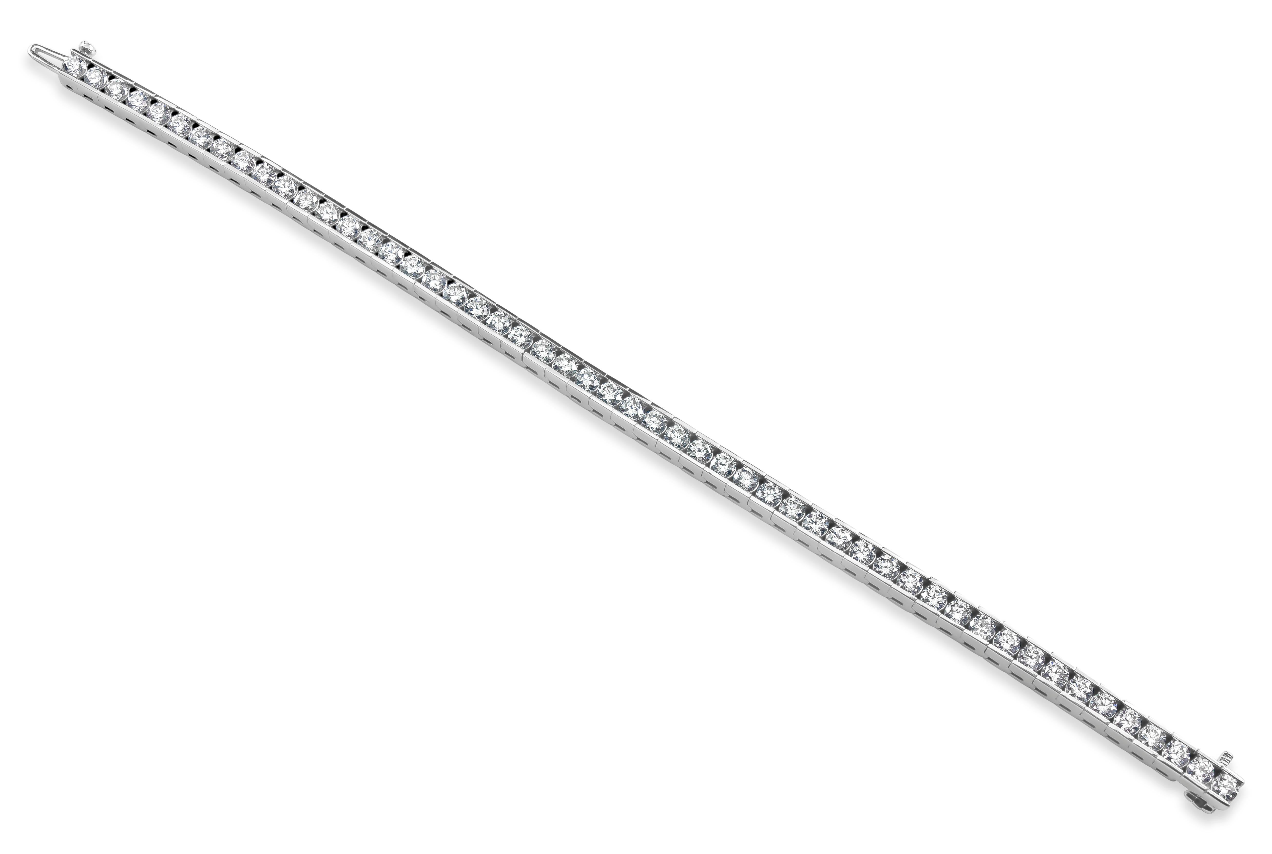 A modern tennis bracelet design showcasing 6.82 carats of round brilliant diamonds, set in a 14 karat white gold channel. 

Style available in different price ranges. Prices are based on your selection of the 4C’s (Carat, Color, Clarity, Cut).