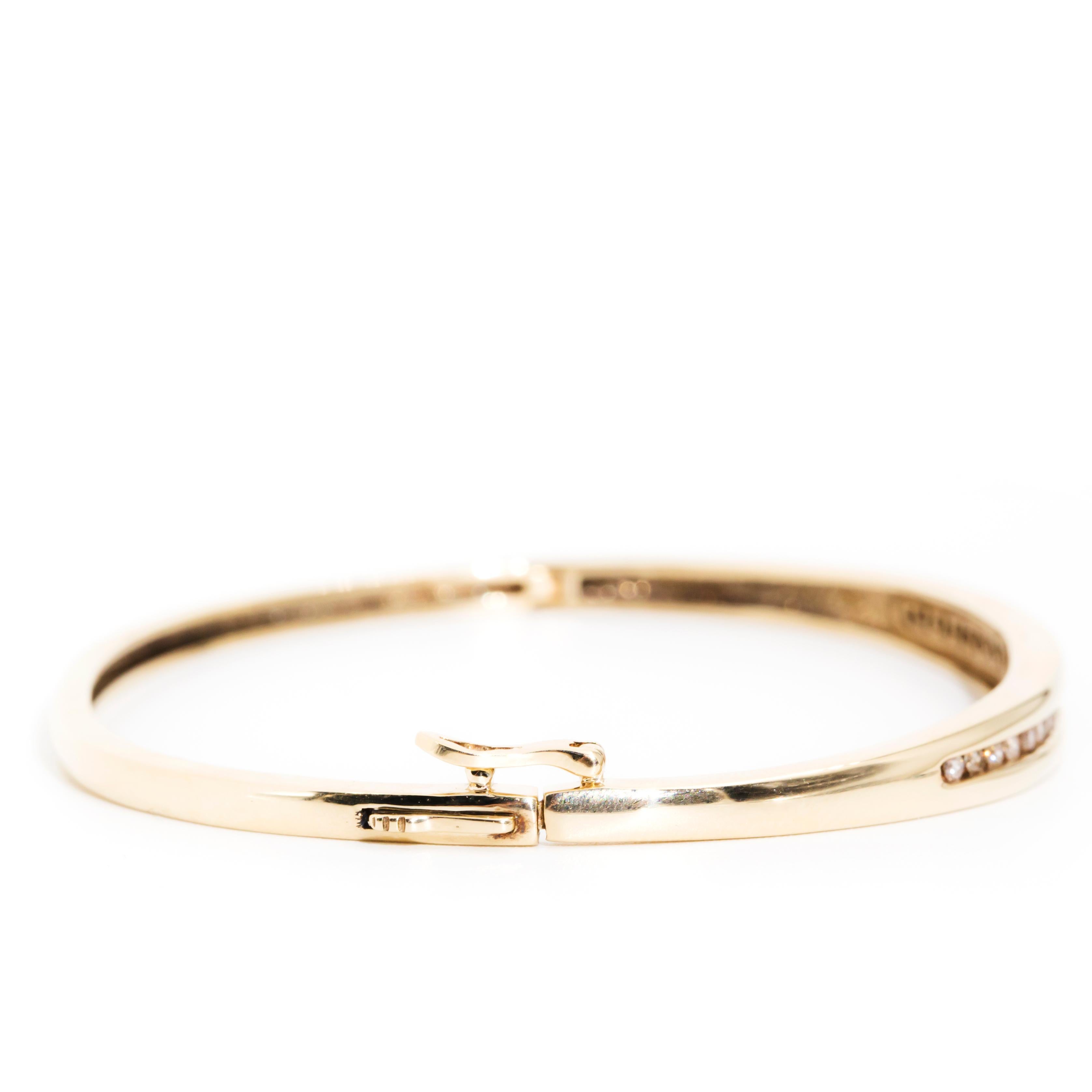 Round Cut Channel Set Round Brilliant Diamond Vintage Hinged Bangle in 9 Carat Yellow Gold