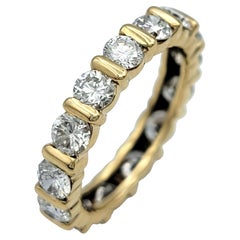 Kanalisierter Diamantring mit rundem Schliff und Ewigkeitsring aus 14 Karat Gelbgold