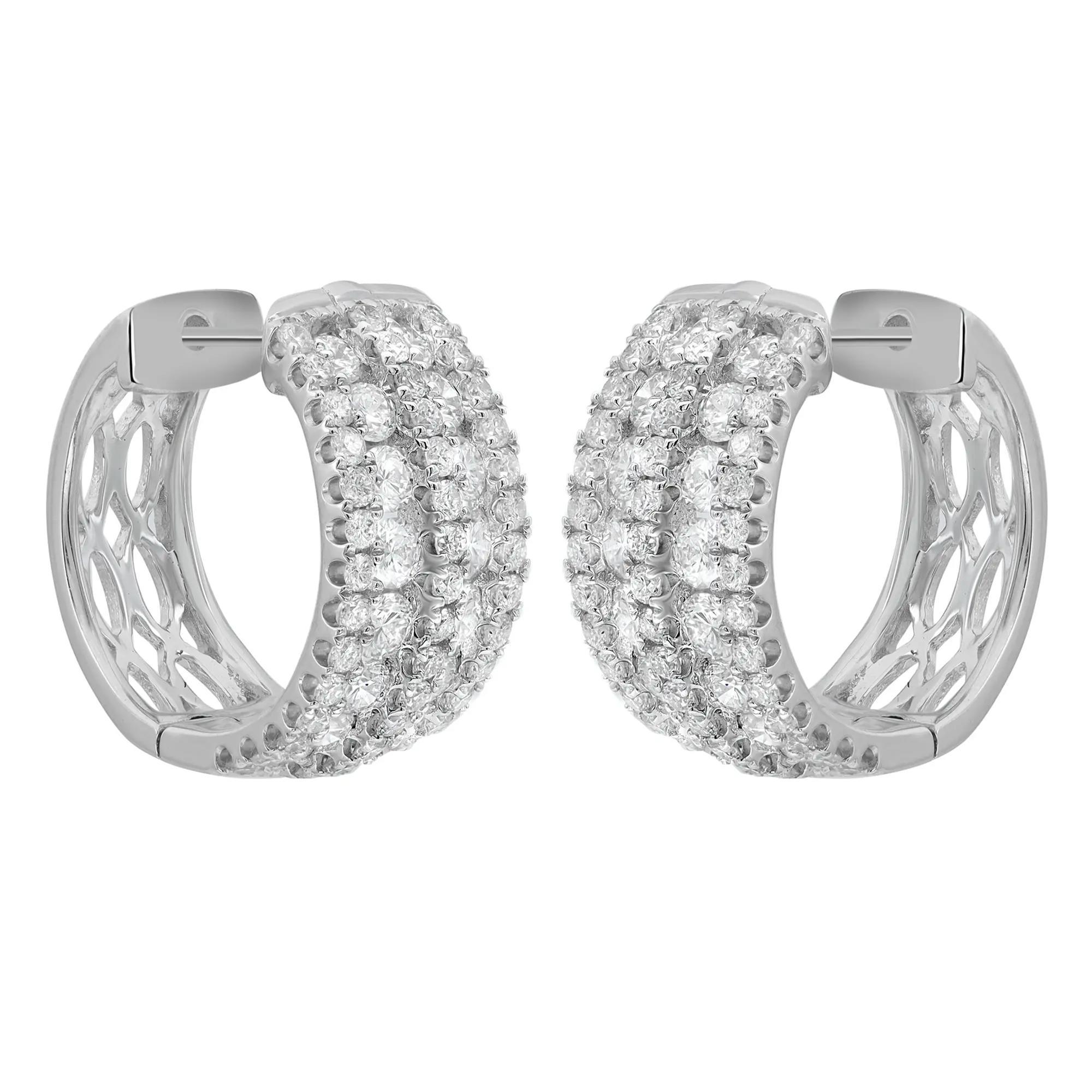 These glamorous diamond huggie earrings feature two rows of channel set dazzling round brilliant cut diamonds with three rows of prong set round cut diamonds. Total diamond weight: 1.40 carats. Encrusted in lustrous 18K white gold. Diamond quality: