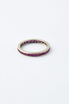 Channel-Set Ruby and Gold Eternity Band Ring