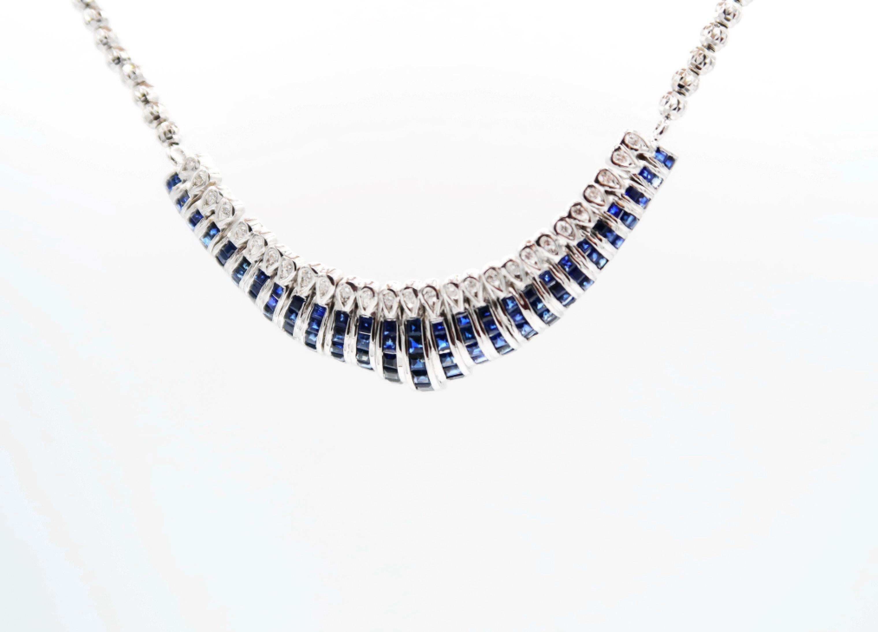 Square cut deep blue sapphire meticulously channel set in 18K white gold piece, embellished with white diamonds strung into necklace with faceted white gold beads.

Gold: 18K Gold, 22.81 g
Sapphire: 4.35 ct
Diamond: 0.35 ct

Length: 16.5 inches