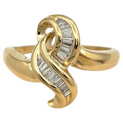 Channel Set Tapered Baguette Diamond Knot Motif Band Ring 14 Karat Yellow Gold