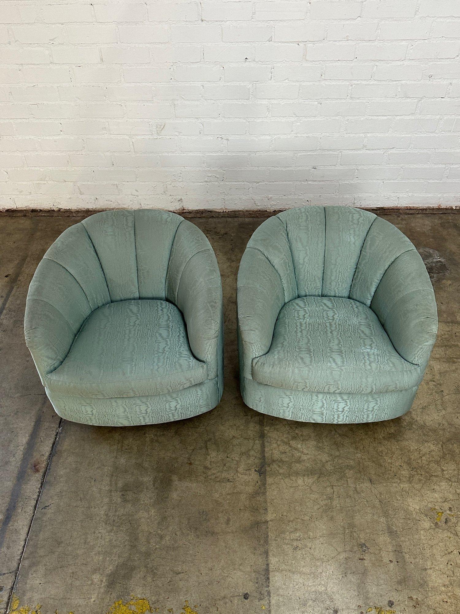 W30 D35 H25 SW19 SD20 SH16.5 AH22

Ottoman W21 D21 H17.5

Fun Vintage Set of Swivel Barrel Chairs with back channel detail. The set comes with one matching ottoman. All three units shows well in original fabric with no stains or rips. Price is for