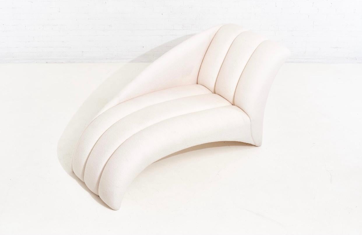 white tufted chaise lounge