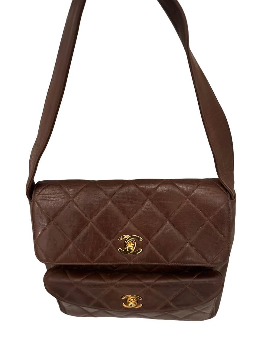 What a classy beauty Chanel vintage handbag that is here just in time! Crafted in gorgeous brown quilted lambskin leather, love the front flap pocket with the CC turn-lock closure.  Both pockets are lined with luxurious satin and the main interior