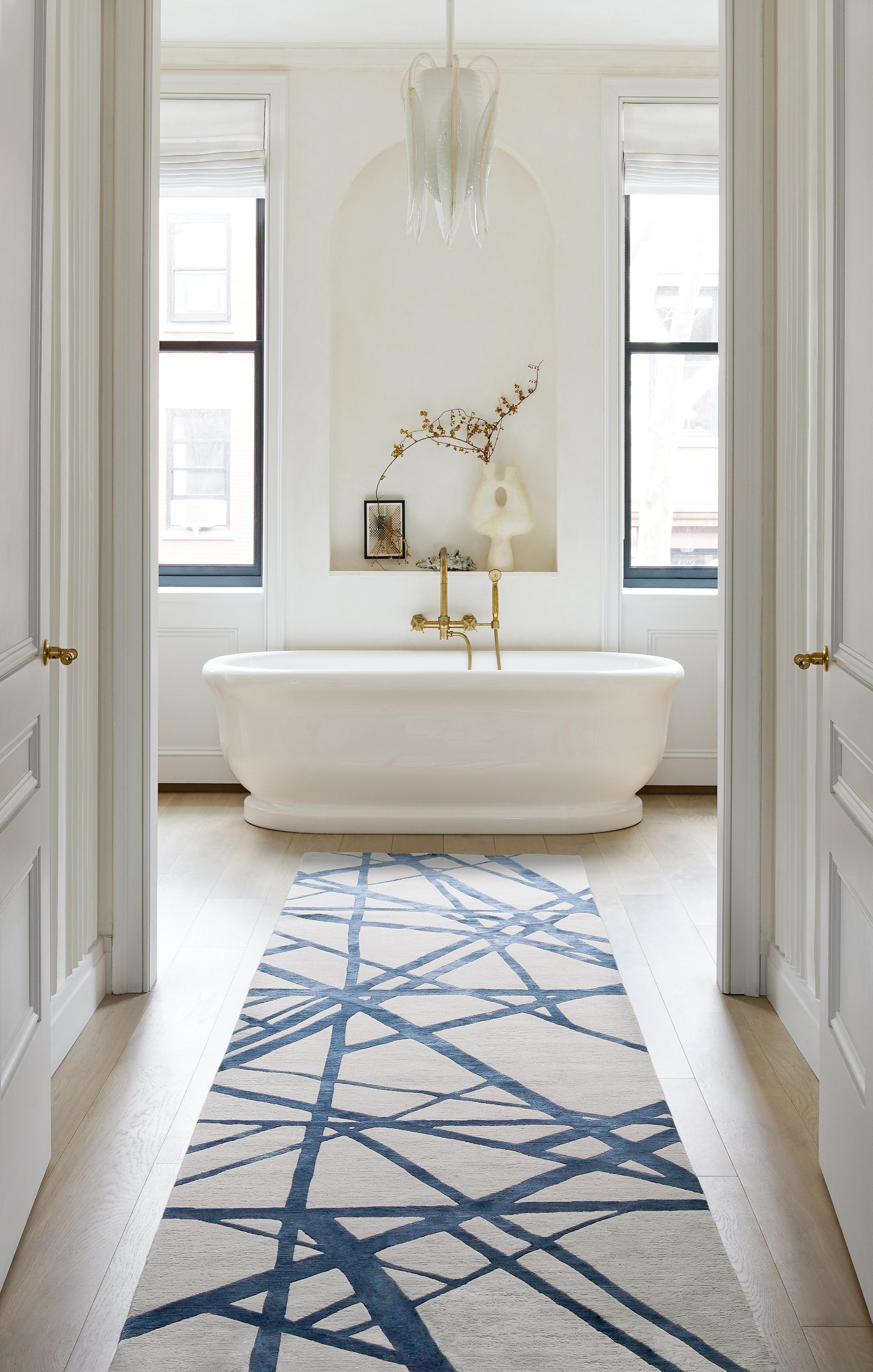 The Channels Indigo runner is an adaption of Kelly’s bestselling Channels Copper rug design, which was created exclusively for TRC20, The Rug Company’s 20th Anniversary. The Channels design represents Kelly Wearstler's interest in street art and