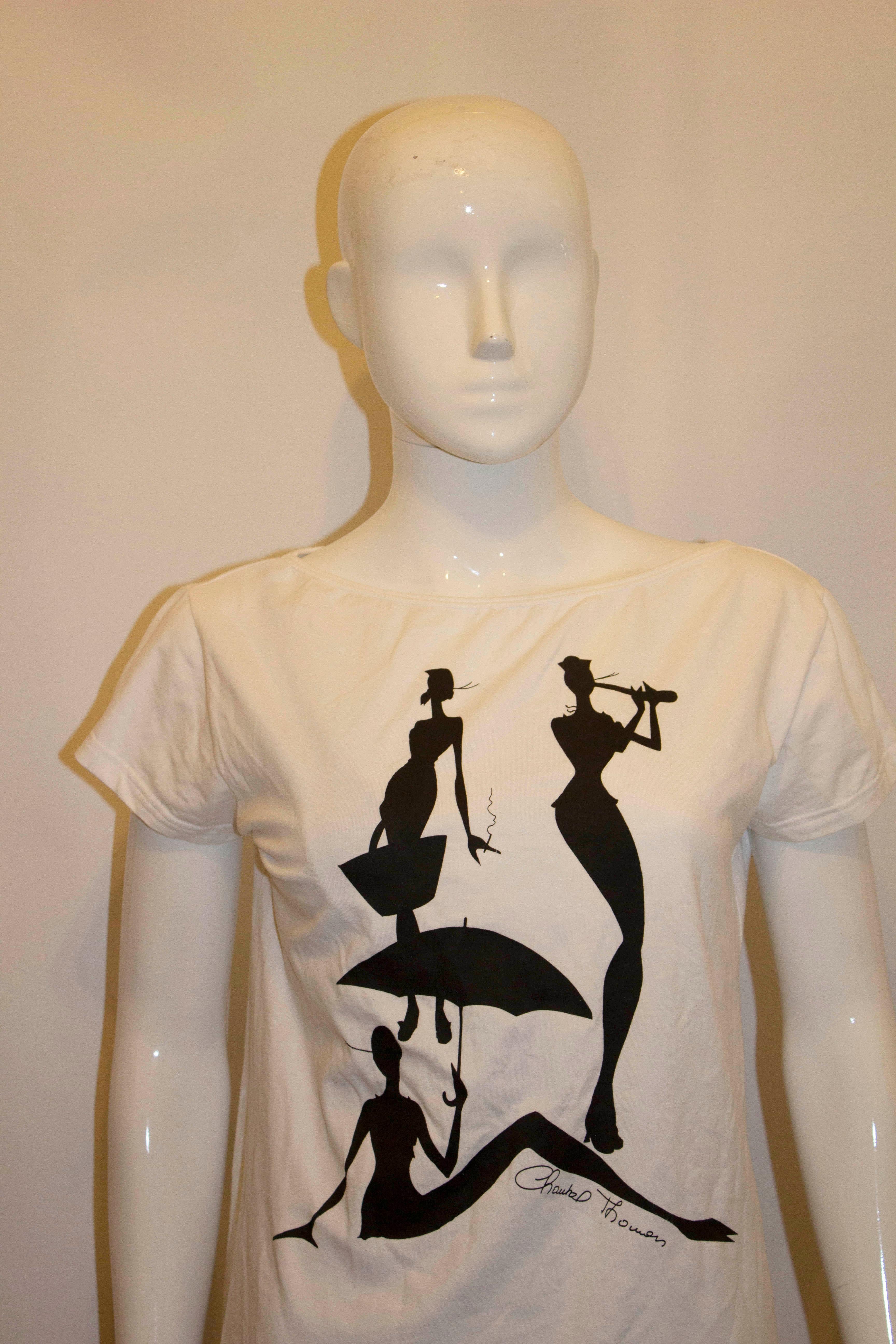 A chic Summer T shirt from French designer Chantal Thomass. In a super soft cotton,  the white T shirt has an attractive black design. 
Made in Italy, Size L Bust 38'',length 25''