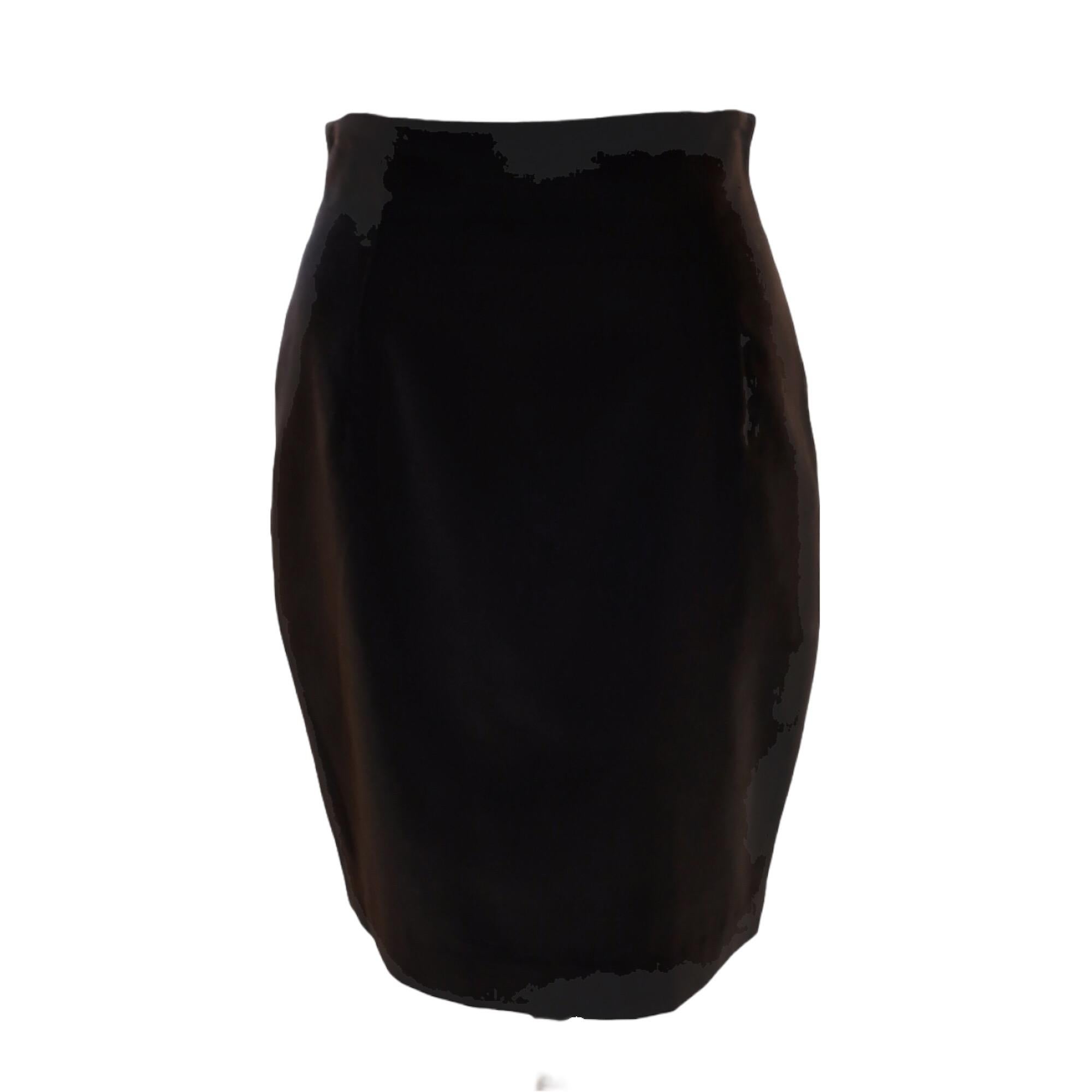 An elegant and simple black velvet curve-hugging pencil skirt from vintage Chantal Thomass zips up the back.