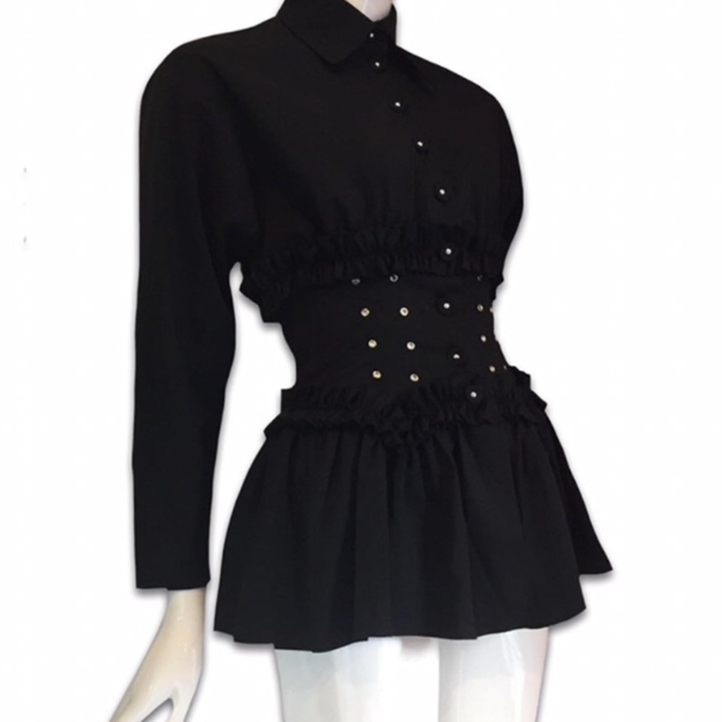CHANTAL THOMASS FW1993 Black shirt with ruffles lace up corset

Tag: THOMASS

Size M

Shoulder: 47cm/ 18,50 inches

Length: 71cm/ 27,95 inches

Chest: 40cm/ 15,74 inches

Sleeve: 51cm/ 20,07 inches

Cotton

Perfect condition

Shipping worldwide with