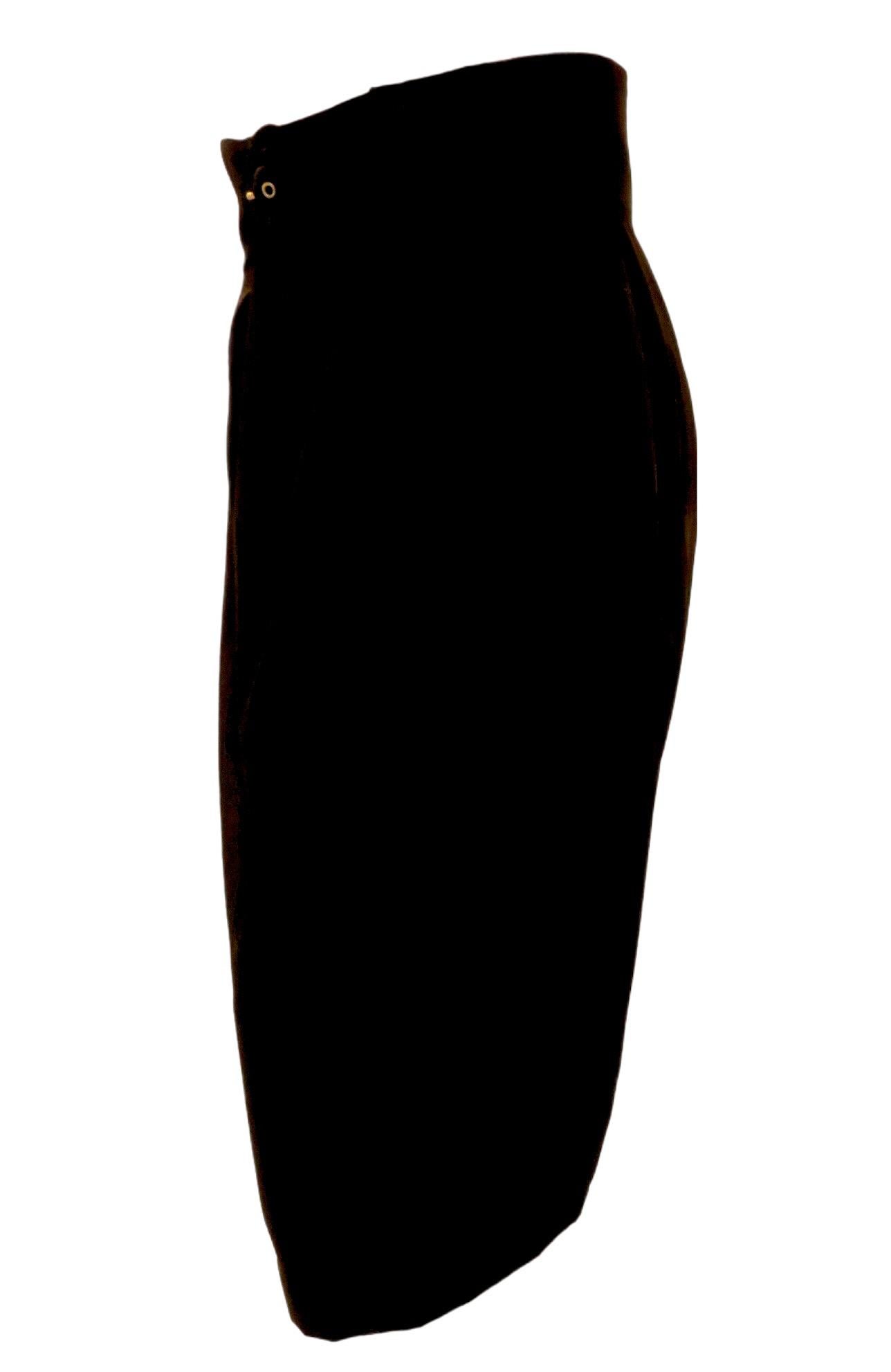 Simply classic Chantal Thomass high-waisted black pencil skirt features an attached front belt, that cinches the waist, two side seam pockets, and a back zipper. Fully lined.