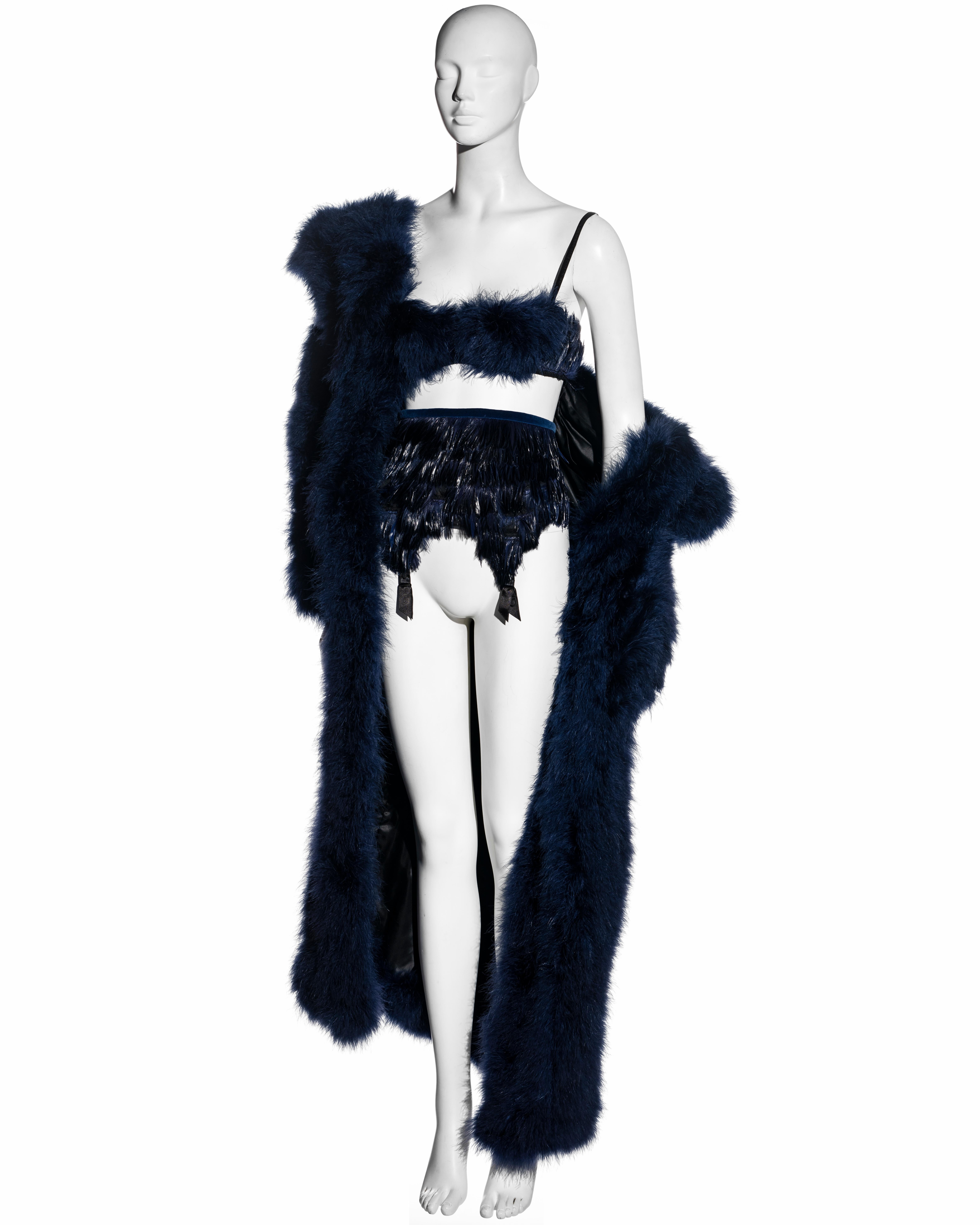 ▪ Chantal Thomass navy blue 3-piece evening set
▪ Oversized coat in marabou feathers 
▪ Matching marabou feather bra 
▪ Garter belt / corset in Rooster feathers 
▪ Size Small
▪ Fall-Winter 1993