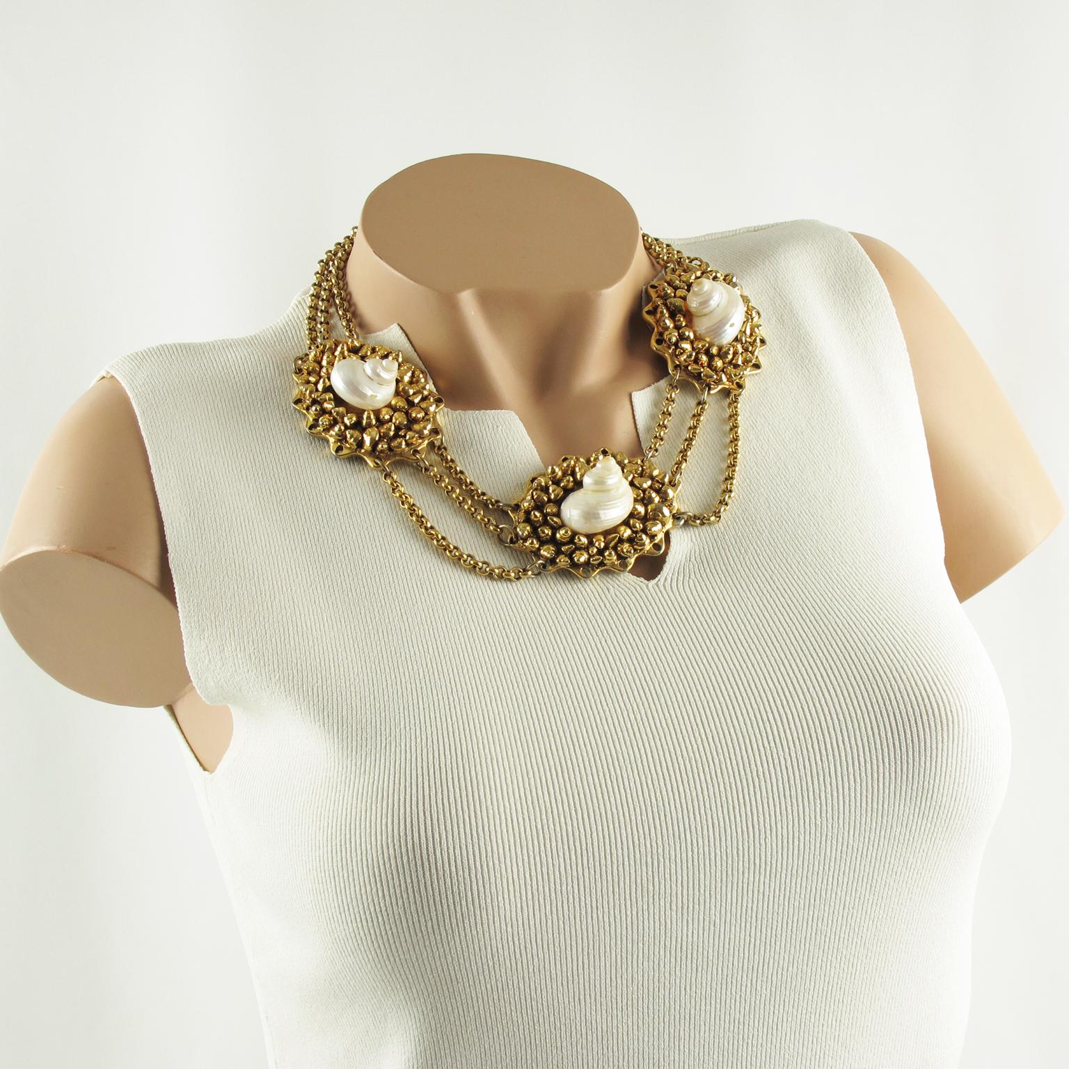 Stunning French fashion designer Chantal Thomass Paris signed choker necklace. Multi-strand gilt metal chain ornate with three huge medallions. Each medallion consists of gilt metal coated resin with tiny seashells carved and textured topped with