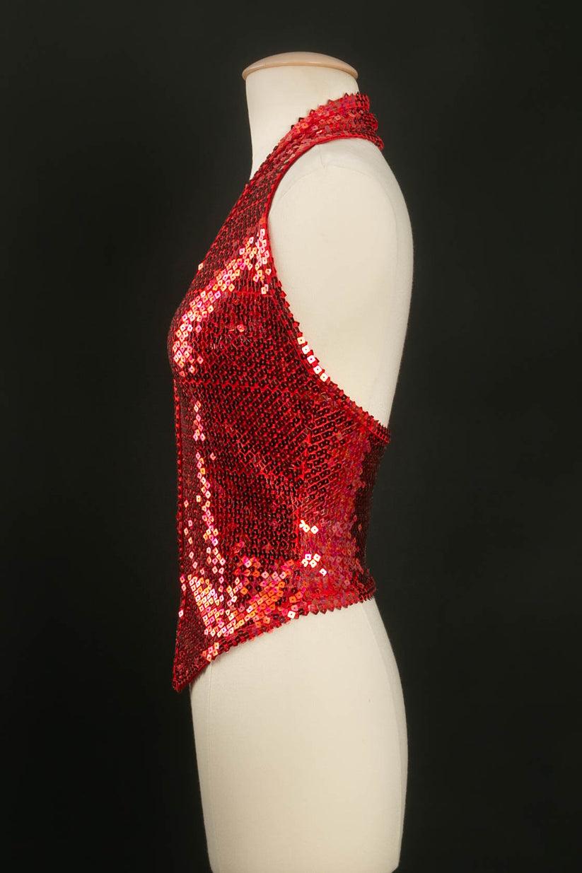 Chantal Thomass - Sleeveless halter vest entirely covered with red sequins. No composition or size tag, it fits a size 36FR.

Additional information:
Dimensions: Bust: 36 cm (14.17