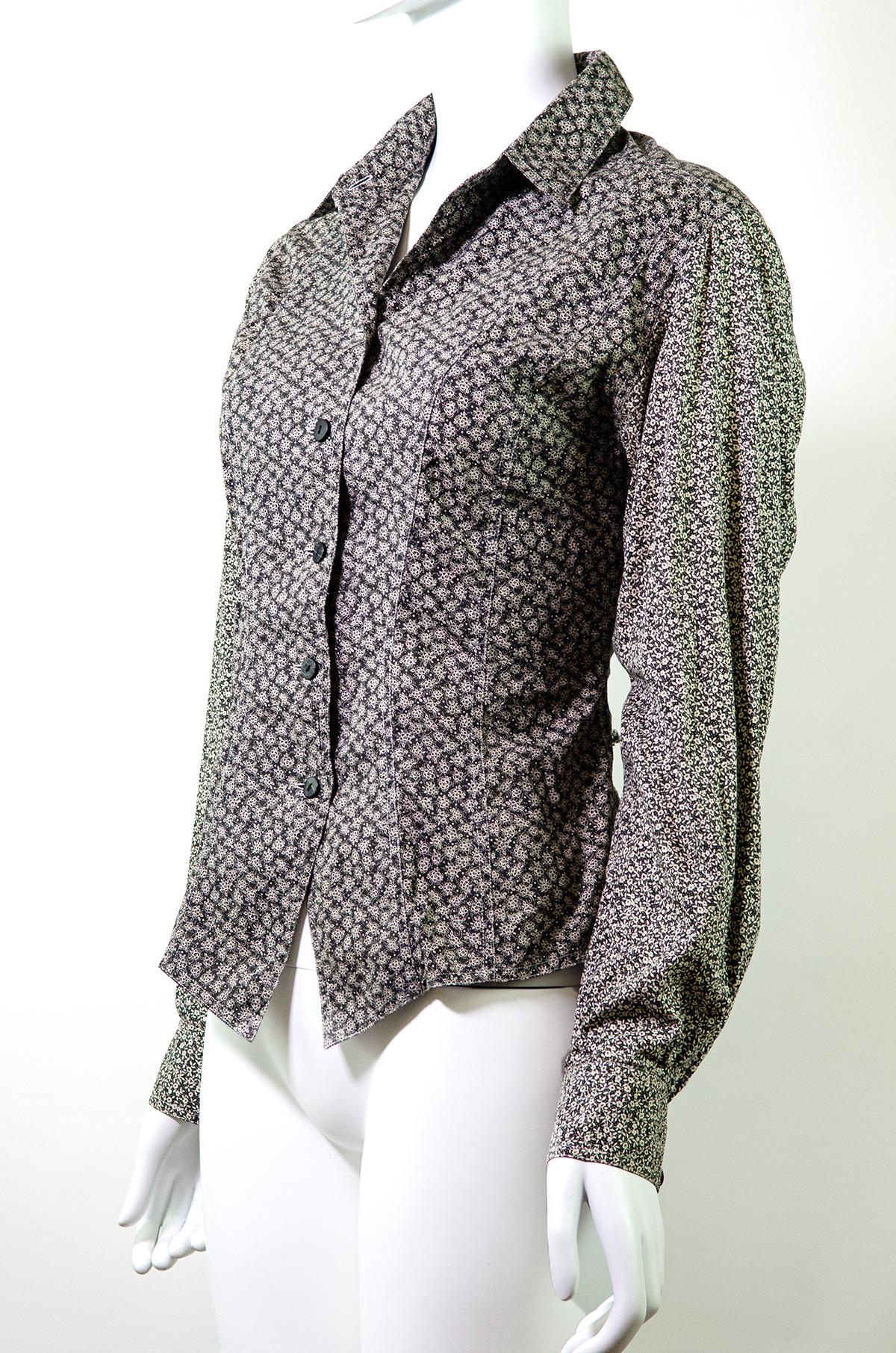 Chantal Thomass Vintage 1990's Lace Up Floral Shirt

Brand: Chantal Thomass
Designer: Chantal Thomass
Collection/Year: 1990's
Fabric: Cotton
Color: Grey
Size: Approx S

Chantal Thomass is the renowned Parisian lingerie brand. Thomass also designed