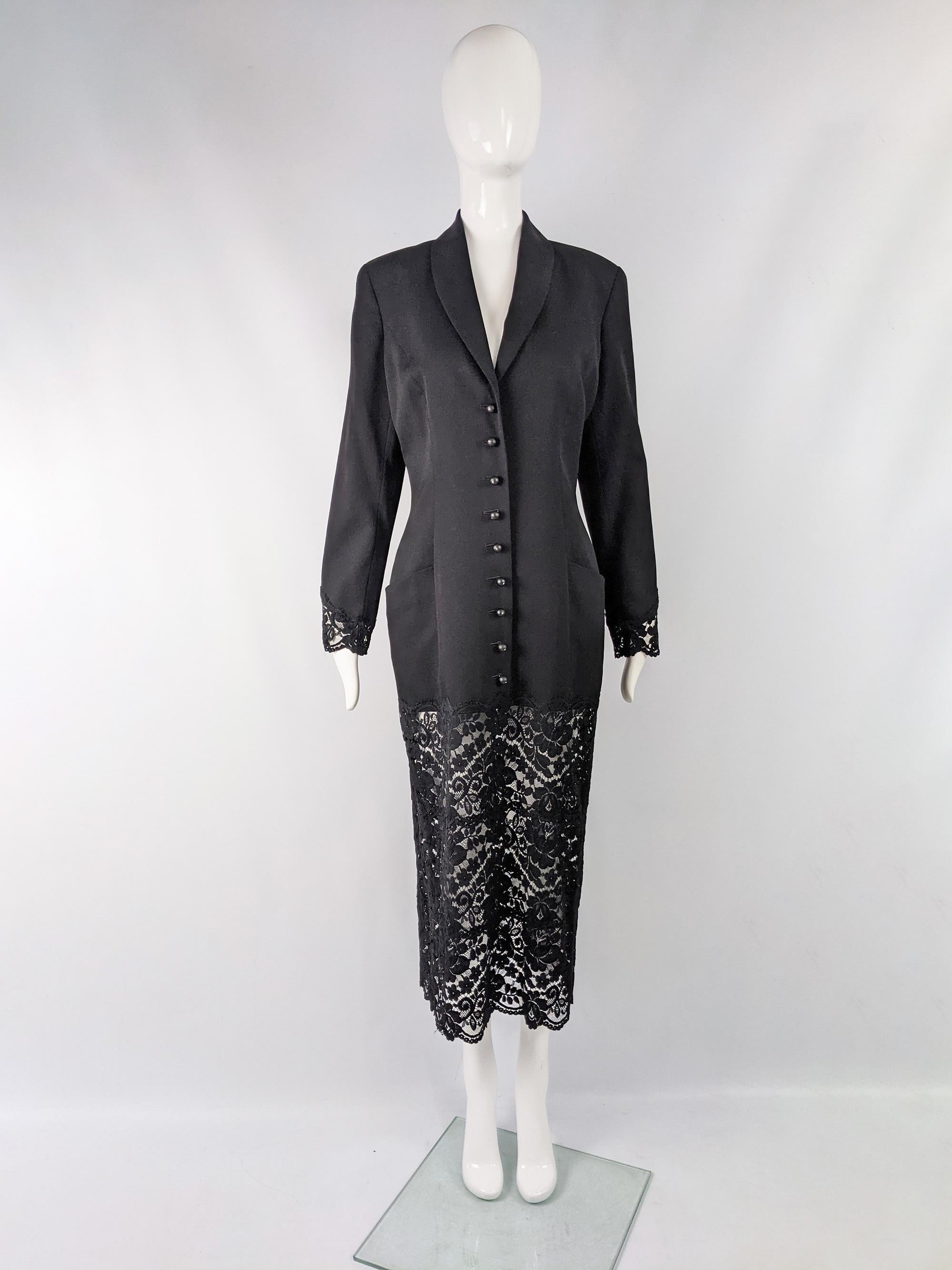 This 1980s vintage tuxedo style dress is by luxury French fashion designer, Chantal Thomass. It was made in France from a black worsted wool with long sleeves, a shawl collar and a long lace hem which gives a nod to her iconic lingerie.

Size: