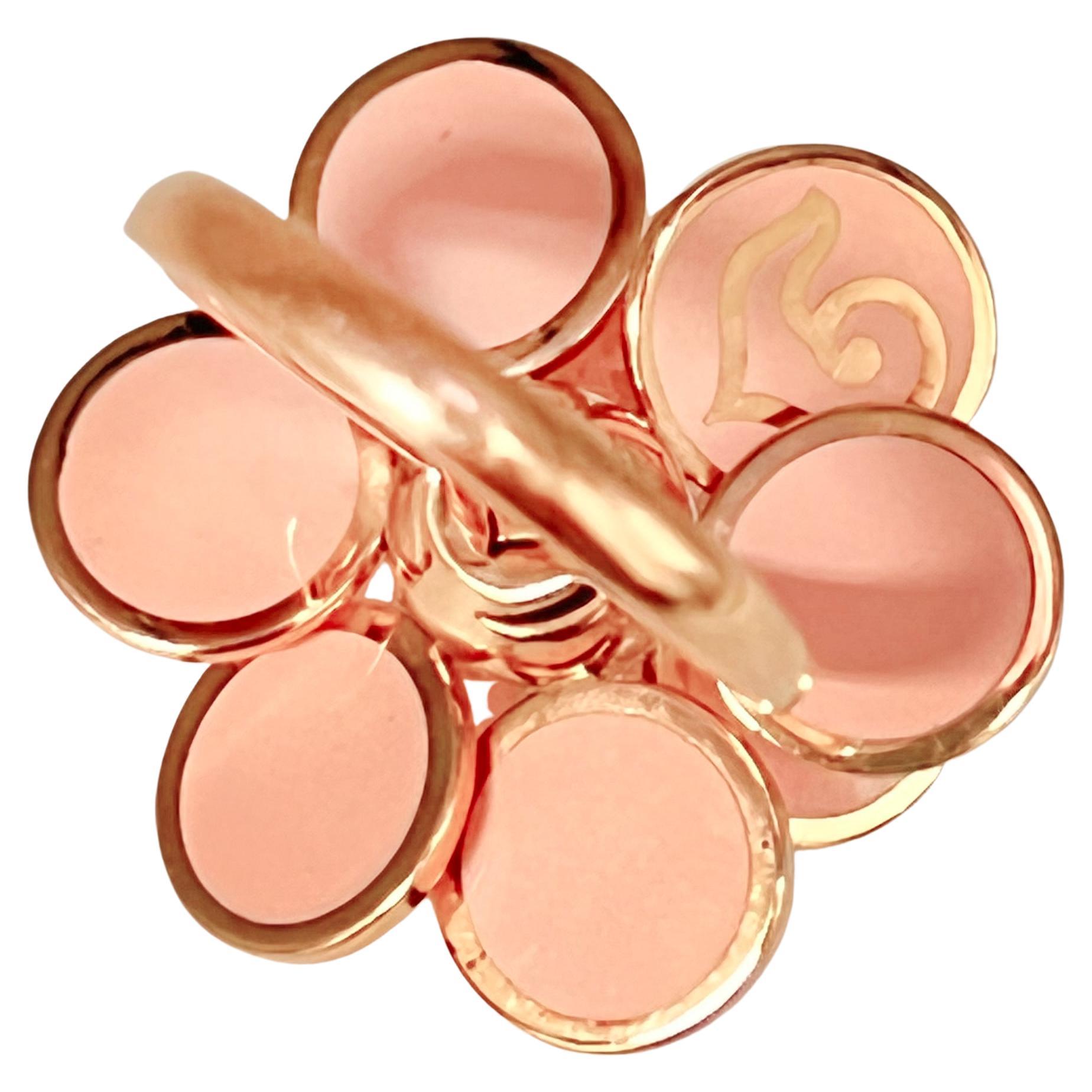 Cascade paillettes ring in 18k rose gold and pink enamel by Chantecler.  Beautiful floral petal top measuring 1.25