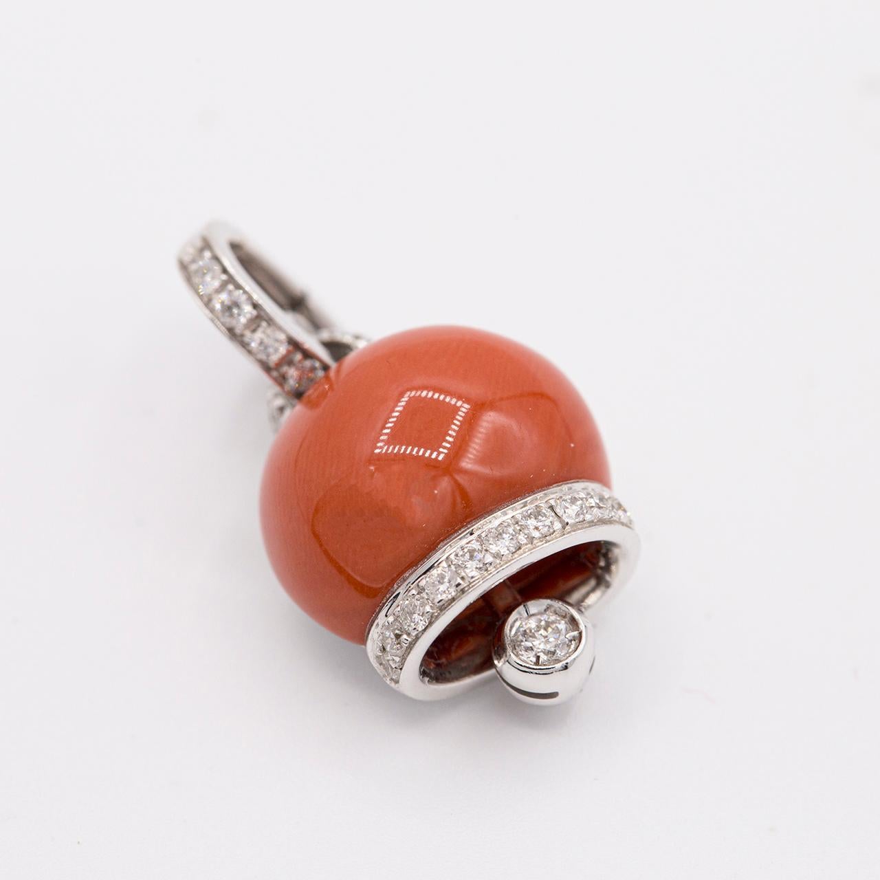 Chantecler jewelry is inspired by the Island of Capri's exotic natural environment. From the Campanella Collection, red coral and pave diamond charm handcrafted in 18k white gold. 
