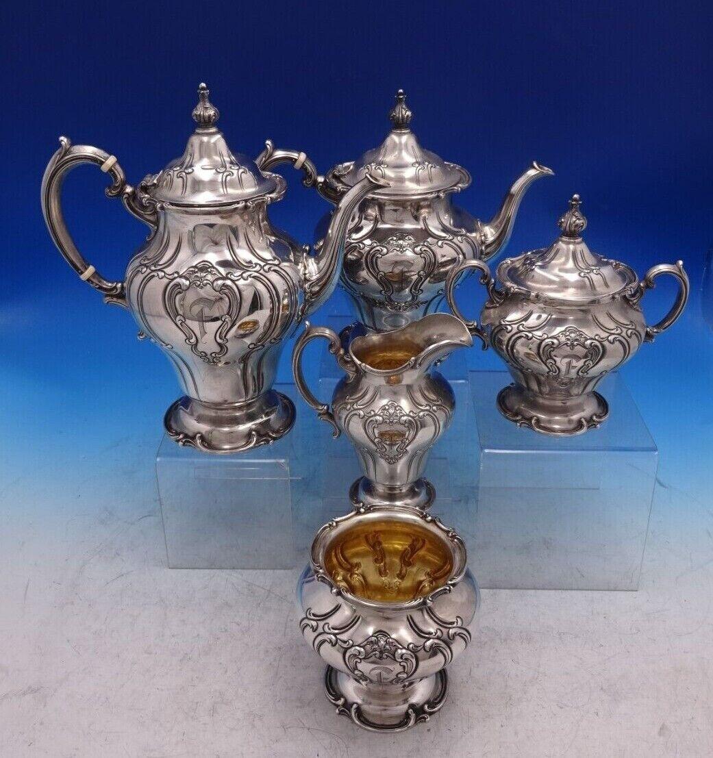 Chantilly by Gorham

Exceptional Chantilly by Gorham Duchess sterling silver five-piece tea set - all hand chased. This set includes:

1 - Coffee Pot: Marked #732, measures 9