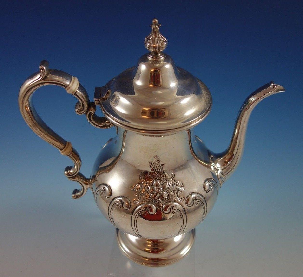 Beautiful Chantilly by Gorham Countess sterling silver coffee pot. It is beautifully hand chased and is marked #1001-2. The coffee pot measures 10 1/2 tall x 9 1/2 and weighs 30.7 troy ounces. It is not monogrammed and is in excellent condition.