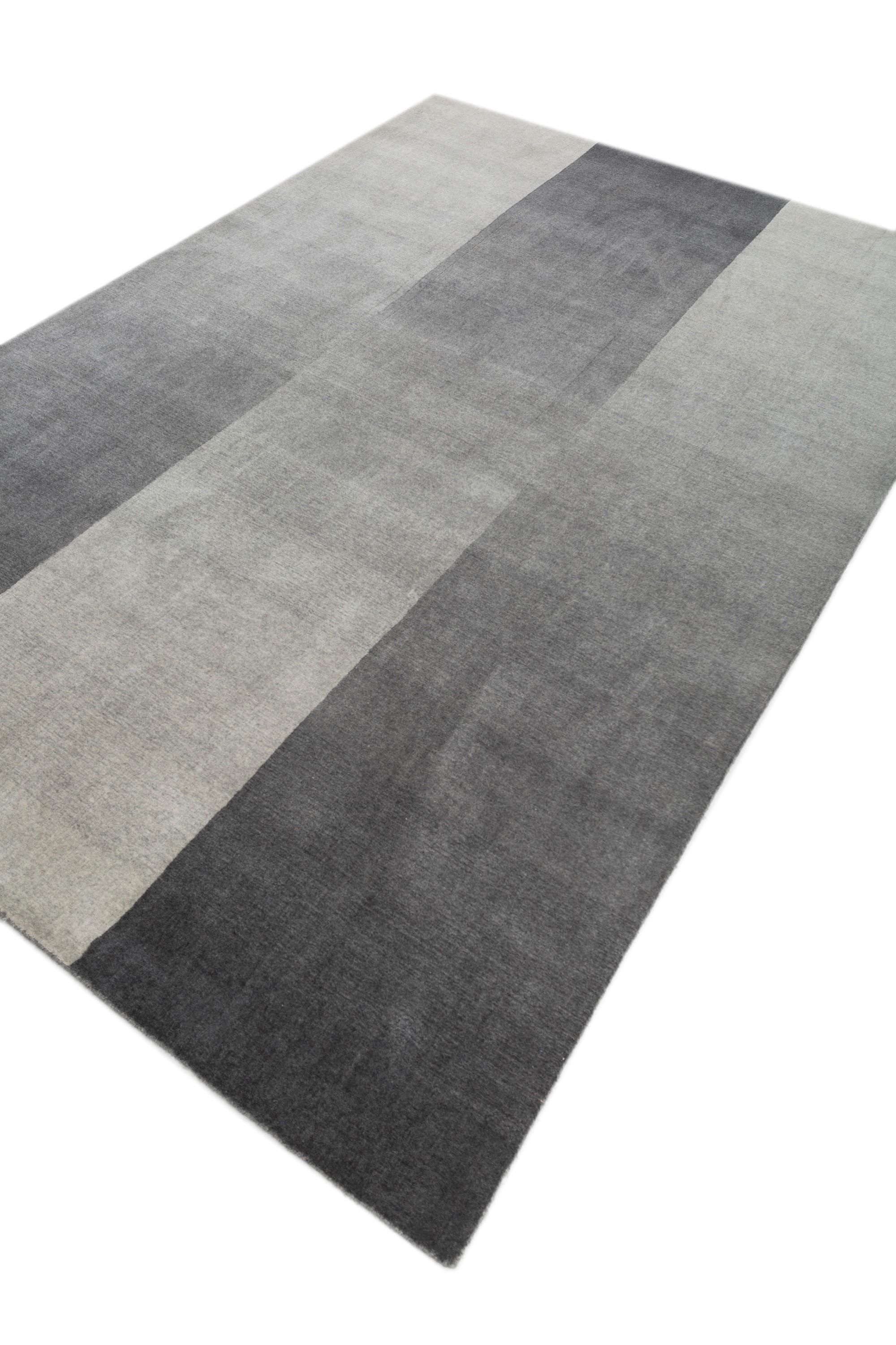 Are you ready to elevate your living space with understated elegance? Introducing our Modern Hand Loom rug—a mesmerizing journey of soothing colors intricately woven on a handloom. Crafted with high-quality yarns, each rug boasts simple yet elegant