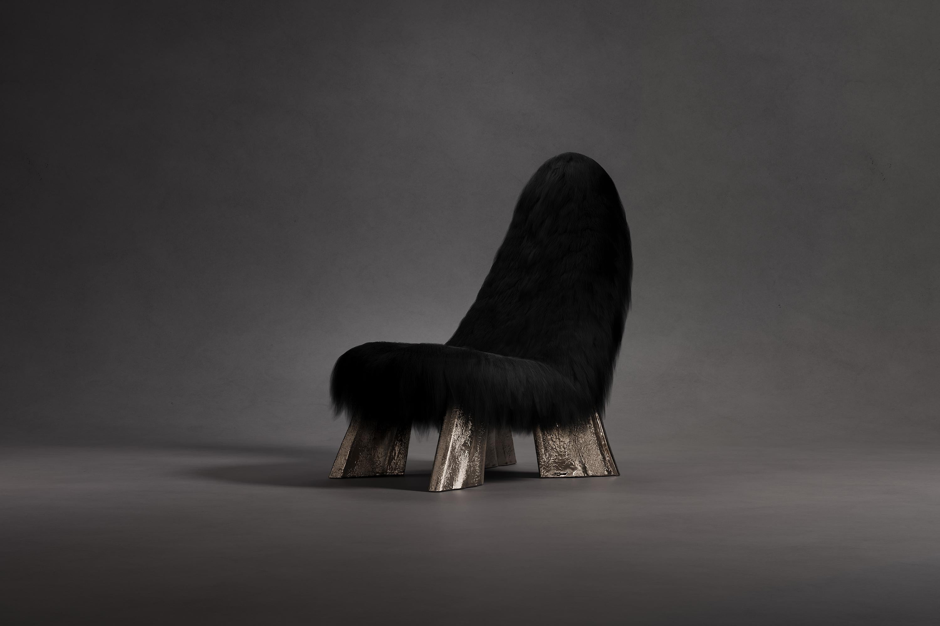 Chaos Chair by Atelier V&F
Limited Edition Of 24+2AP Pieces.
Dimensions: D 95 x W 70 x H 110 cm. 
Materials: Goatskin offcuts and cast brass.

「Chaos Chair」descends infinitely closer to the ground, solidly and steadily, like a steep hill or a ready