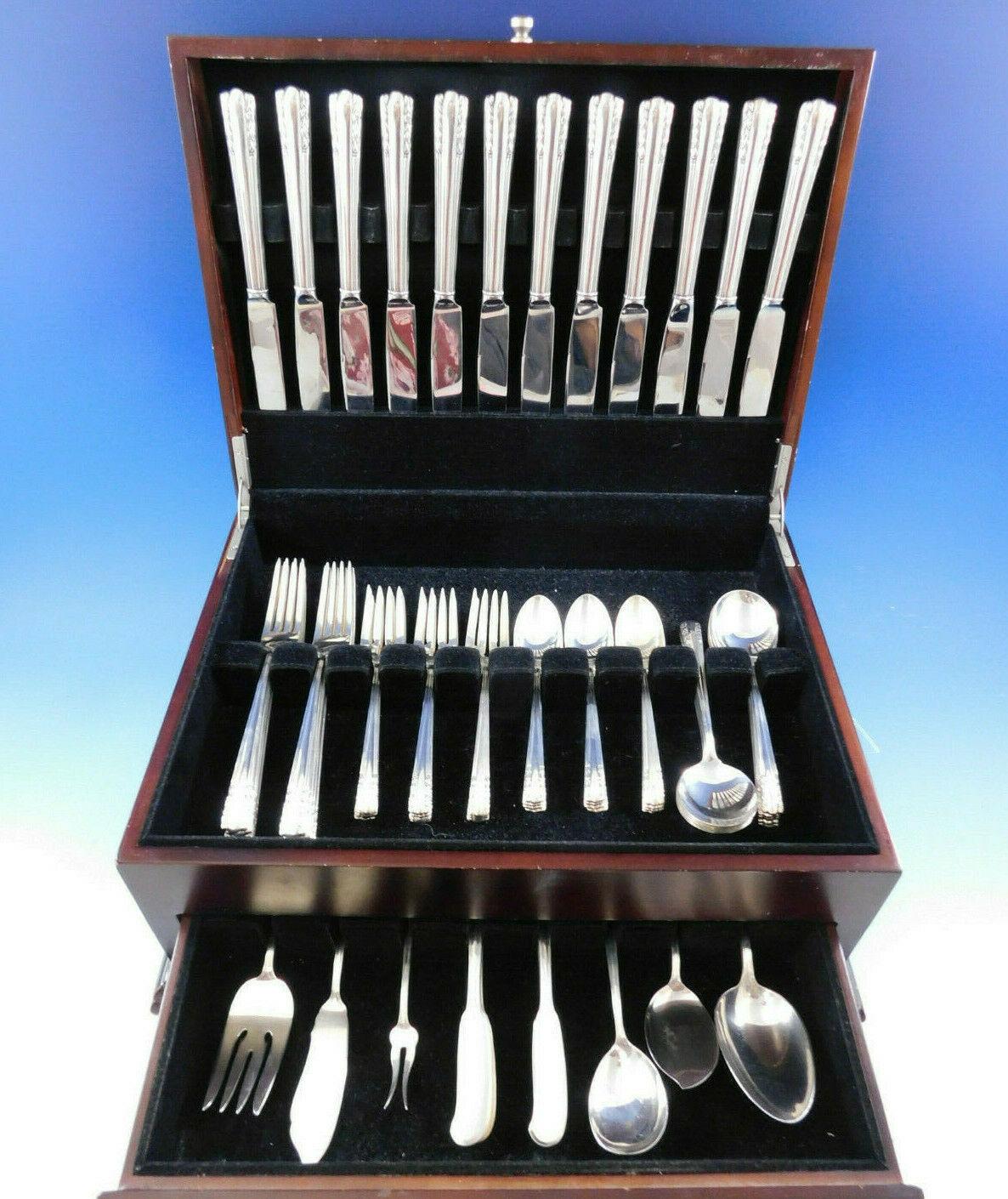 Dinner size chapel bells by Alvin sterling silver flatware set, 79 pieces. this set includes

12 dinner size knives, 9 1/2