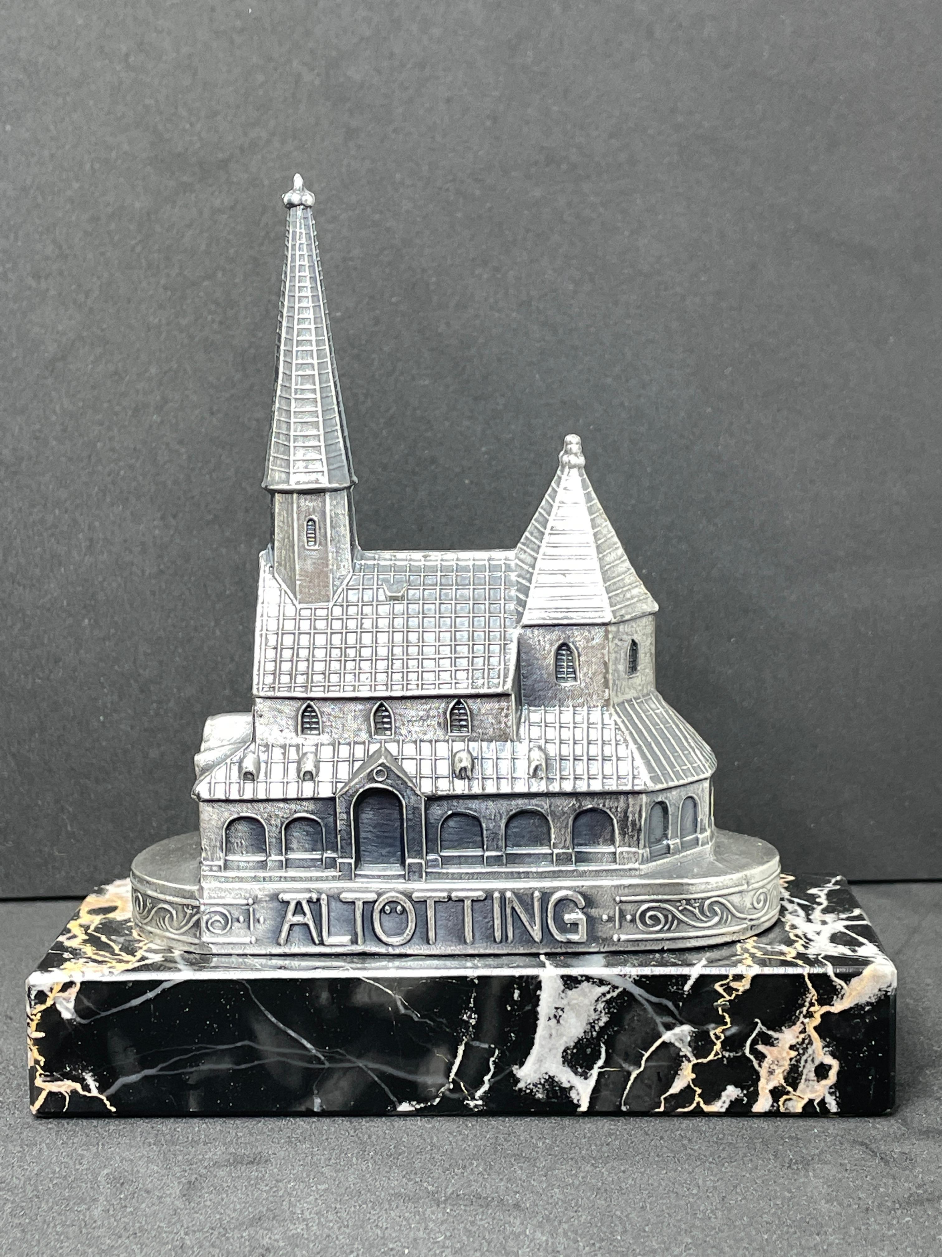 A decorative souvenir building sculpture. Some wear with a nice patina, but this is old-age. Made of metal and a marble base. This item was bought as a souvenir in Altötting, Germany and was made probably in the 1950s. You can use it also as a